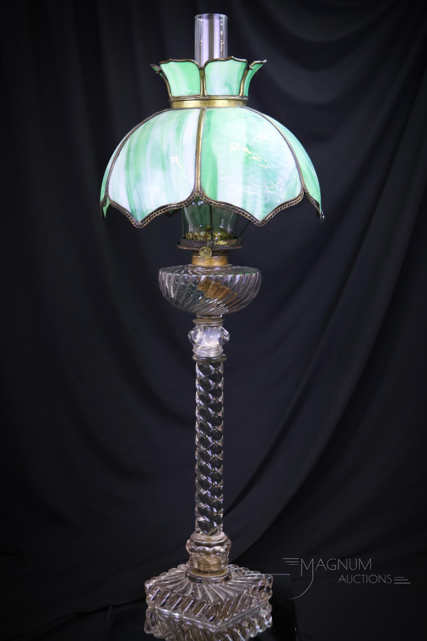 Fostoria 35" Colony Swirl Cascade Victorian Banquet Oil Lamp: Another find in our lineup of Victorian oil lamps. This is a Fostoria Colony Swirl Cascade pattern banquet oil lamp. What a lovely presence it has. This lamp comes with a green bent panel slag glass s