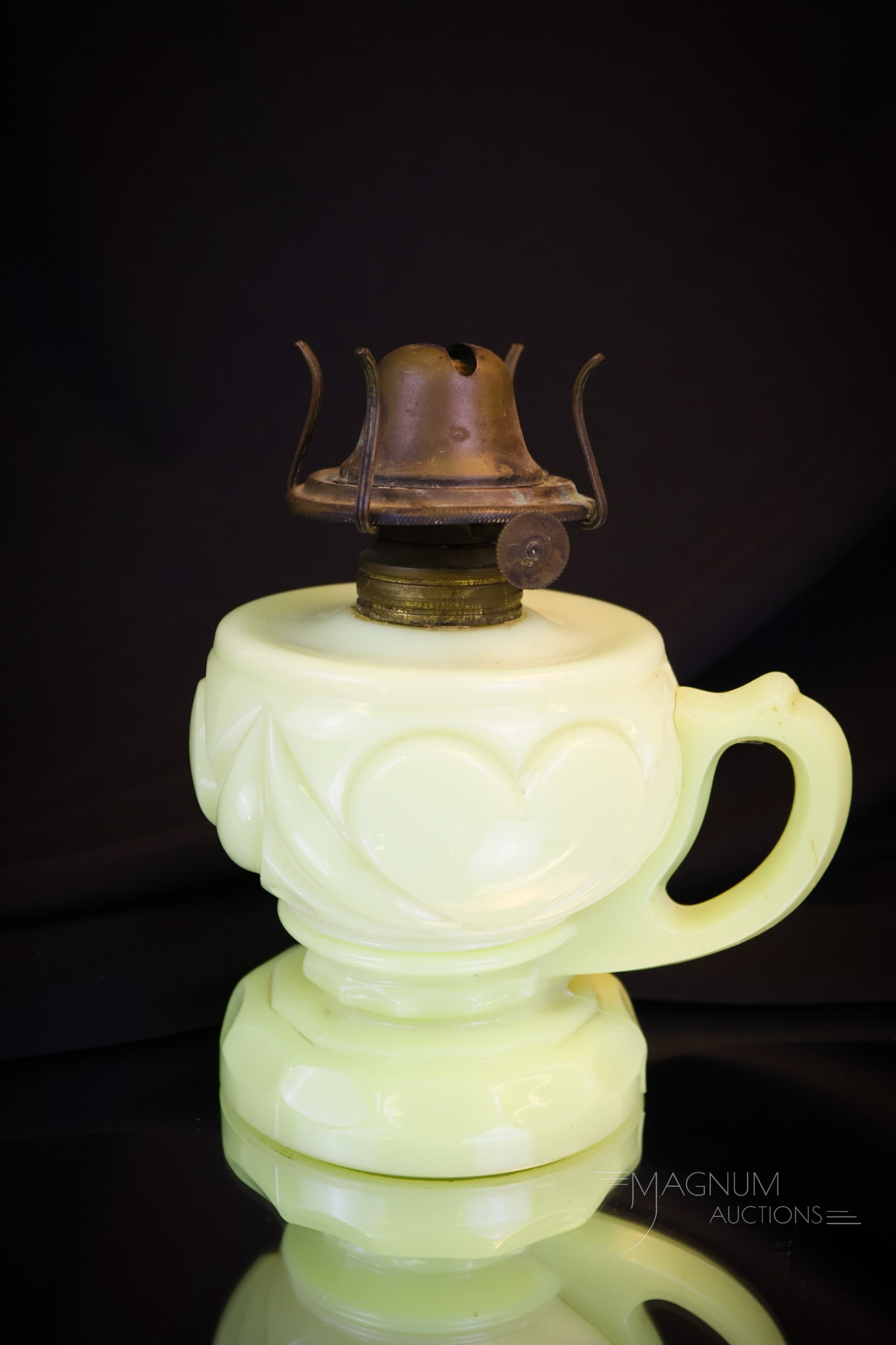 Tarentum Custard Heart & Thumbprint Victorian Finger Oil Lamp: Take note of the beautiful lamp we are offering for your bidding pleasure. This super example was made by Tarentum glass. It is in the Heart & Thumbprint pattern. The lamp has a nice enameled decorati