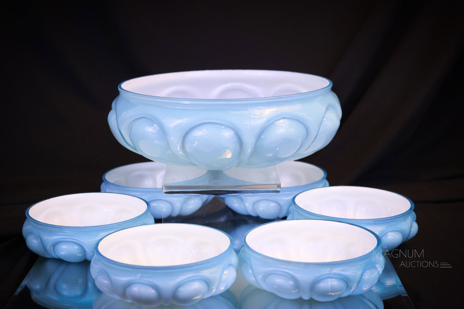 7 pc Fostoria Consolidated Victorian Glass Bulging Loops Blue Berry Set: Seldom found Victorian Fostoria Consolidated Glass berry set in the Bulging Loops pattern. This fine offering is in rich blue cased glass. The set is complete and so hard to find! The largest measures