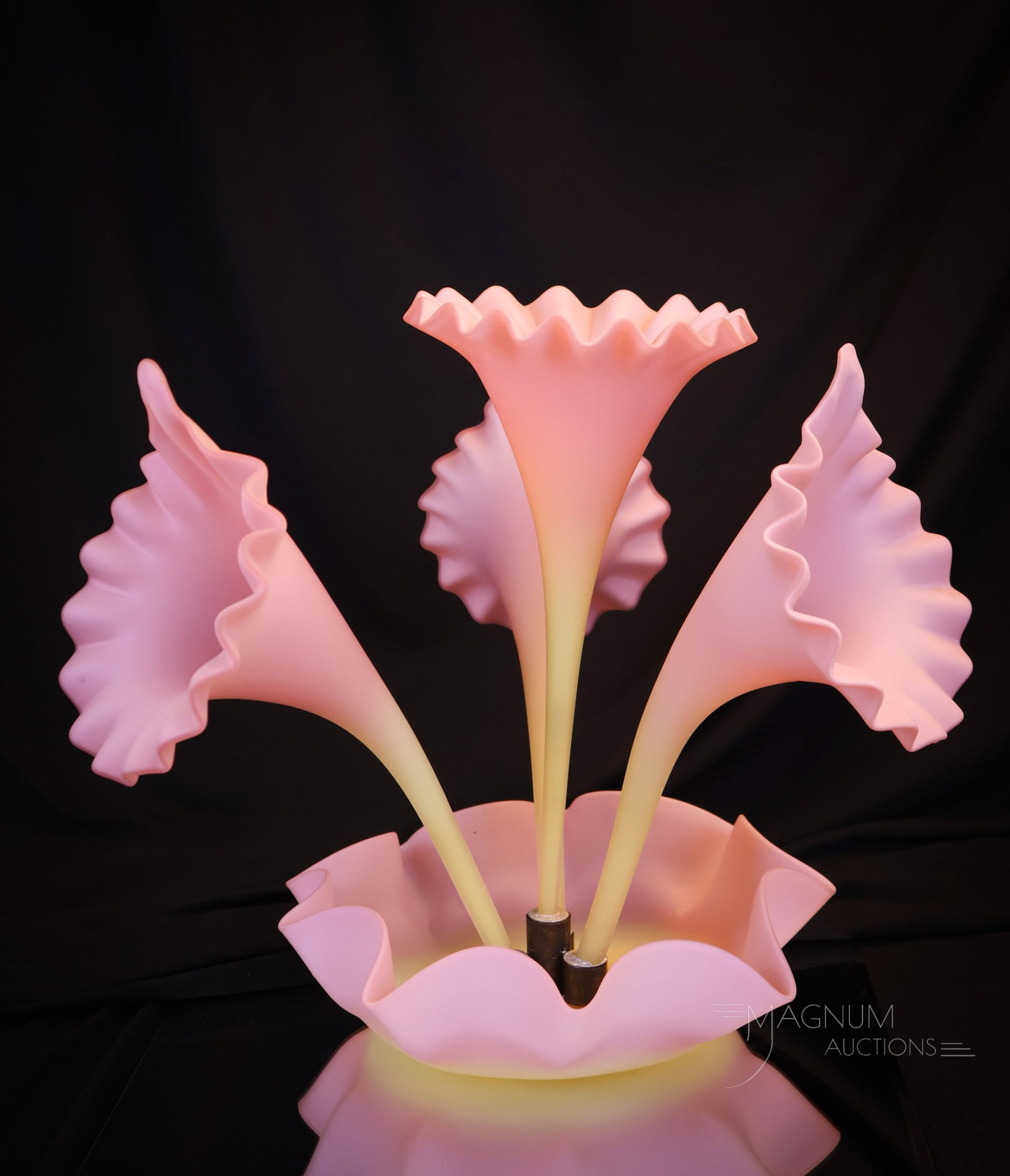 Italian Murano Burmese Art Glass Epergne Centerpiece: The graceful beauty of this fine centerpiece is almost too much to take in. The coloring is perfectly shaded burmese peach to yellow color. This centerpiece would be the envy of anyone at your dinner 