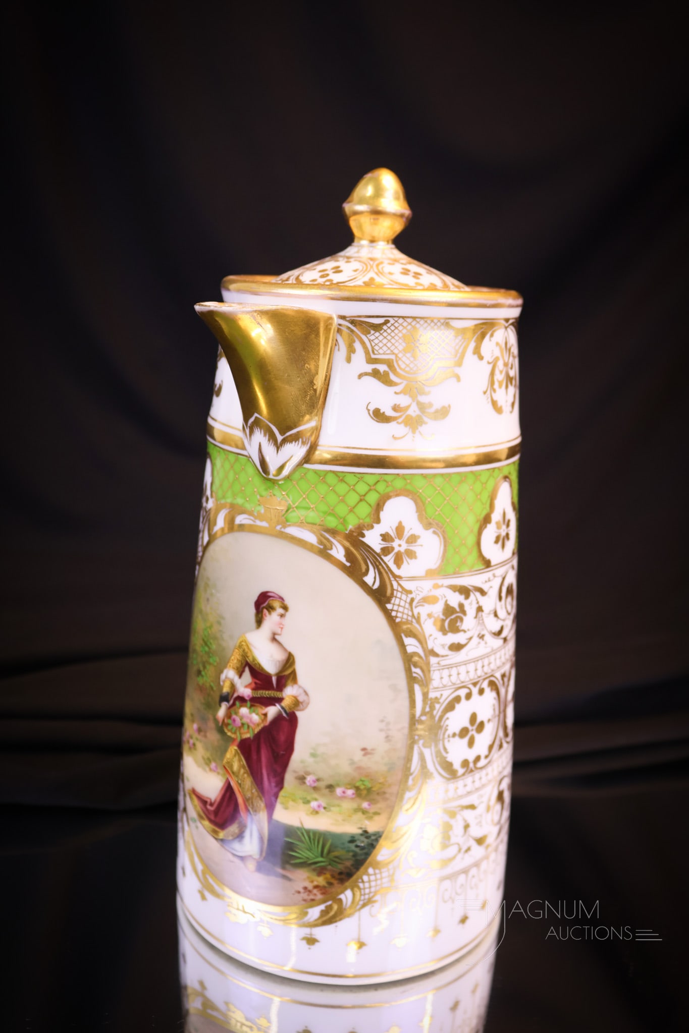 Dresden German marked Portait Porcelain Coffee Pot: A fine Dresden, Germany marked coffee pot featuring a portrait of a regal woman and decorated with green and gold band. This piece measures 9"" tall and 5 1/2"" wide. Shipping: At checkout, select ""A