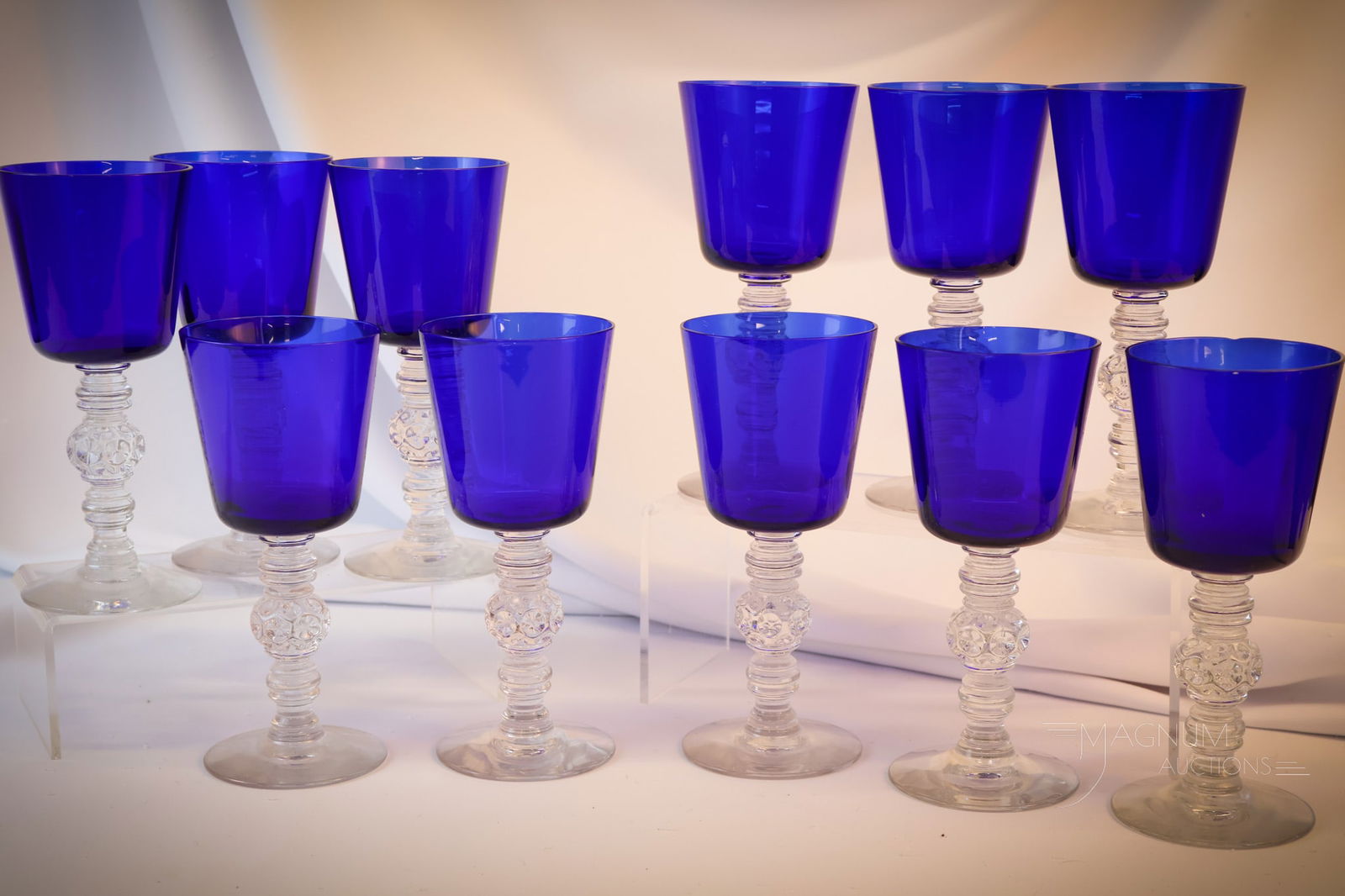 11 Heisey Spanish Cobalt Water Goblets: Select offering of eleven Heisey Spanish pattern cobalt glass water goblets. Each measures 7 1/2"" tall and 3 1/4"" wide. Shipping: At checkout, select ""Arrange your own shipping"". For all overs