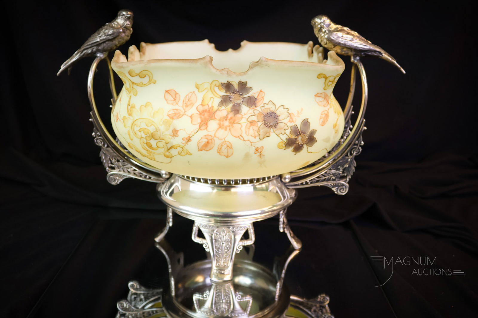 Mt. Washington Crown Milano Victorian Glass & Pairpoint Bride's Bowl Centerpiece: A beautiful fin in Victorian Mt. Washington glass. This is a signed Crown Milano glass decorated glass brides bowl. The glass is rich in uranium and glows brightly under black light. It is set in a si