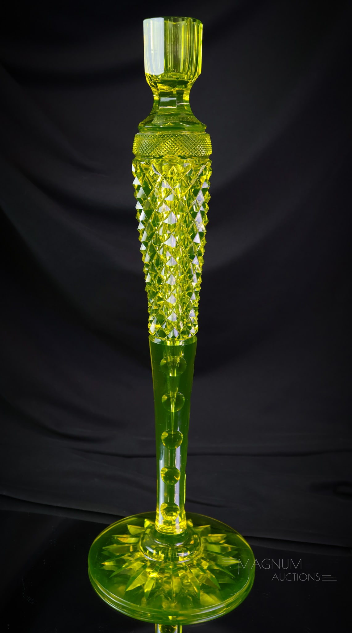 Rare Pairpoint Vaseline Cut Glass 15" Candlestick: An amazing rarity. This is a Pairpoint cut glass vaseline glass candlestick. This super stick measures 15" tall of pure eye-popping pleasure. Alas, like all of us, It has an issue. This candlestick ha