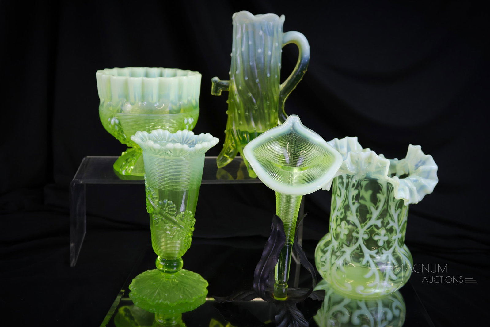 5 pc Lot Northwood Vaseline Opalescent & More Glass: Five fine examples of Victorian Northwood glass in vaseline opalescent. This lot offers vases and more. There is a Town Pump. A threaded vase in a holder. Lastly, there are three vases, including a Sp