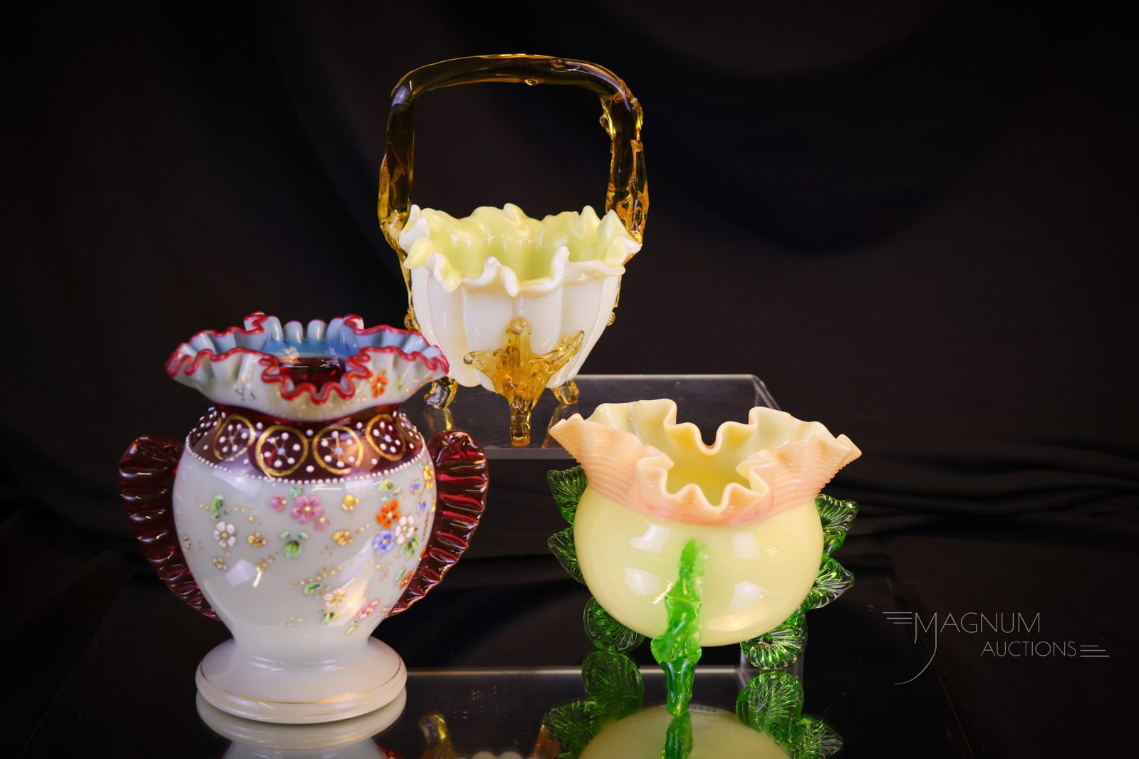 3 pc Lot Uranium Applied Victorian Art Glass: Three distinct finds in Victorian applied glass that are rich in uranium content. The first piece is a cut fingered top basket with an applied amber handle and feet. The second is a white enameled gla