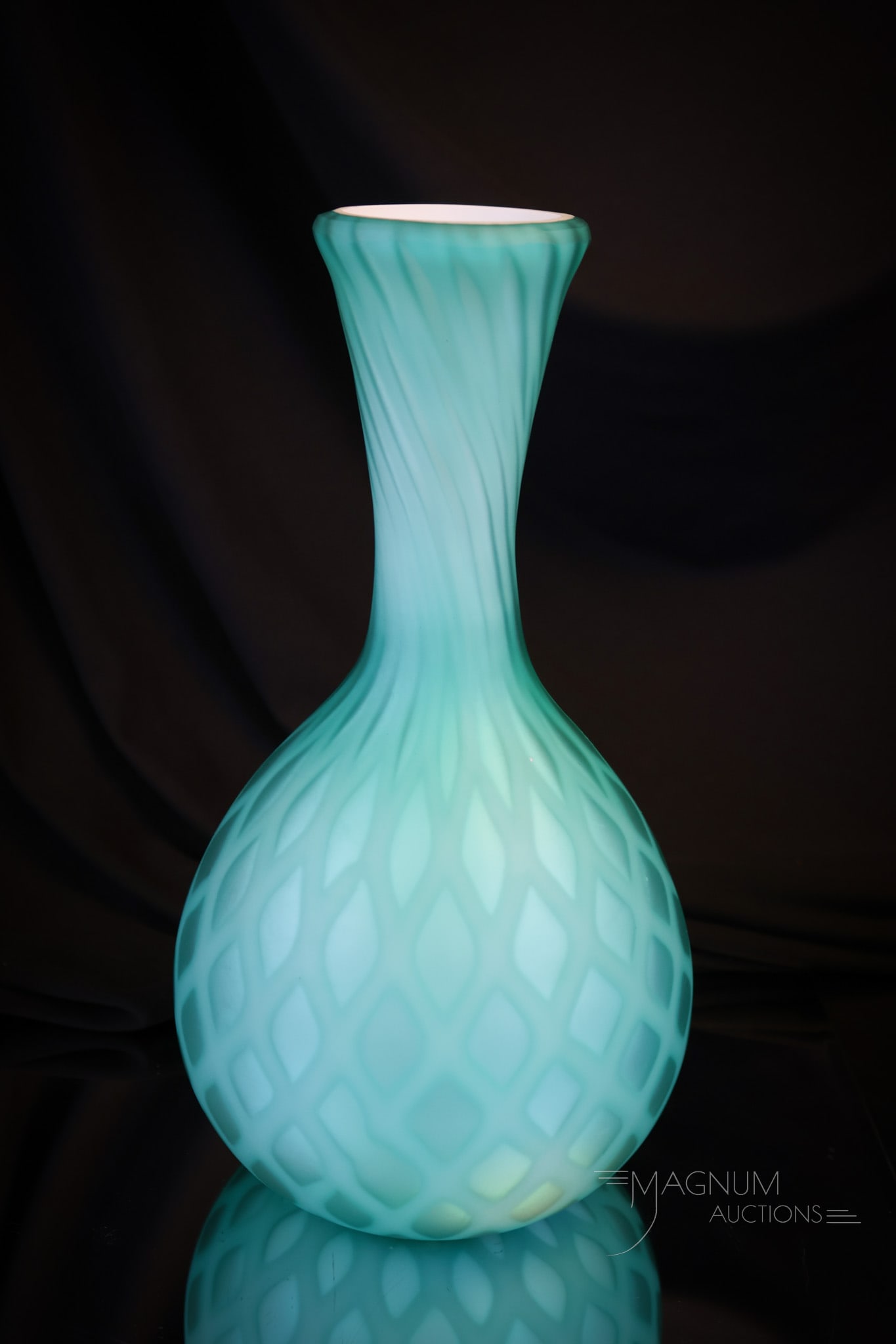 Unusual Mother of Pearl Turquoise satin Diamond Quilt Vase: A beautiful and vibrant colored mother-of-pearl satin glass vase in turquoise. This bottle-form vase is quite attractive, and the color is superb. The vase measures 9 3/4" tall and 4 3/4" wide. Shippi