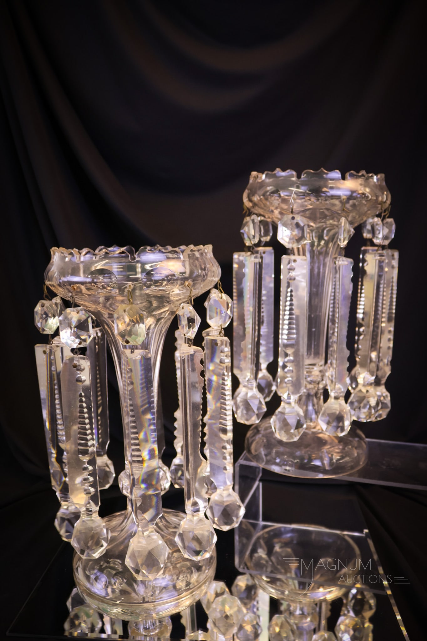 Pair Victorian Cut Glass Crystal 11" Mantle Lusters: A beautiful pair of Victorian cut crystal glass mantle lusters. Each is adorned with heavy cut prisms. Both lusters measure 11" tall and 5 1/2" wide. Shipping: At checkout, select "Arrange your own s