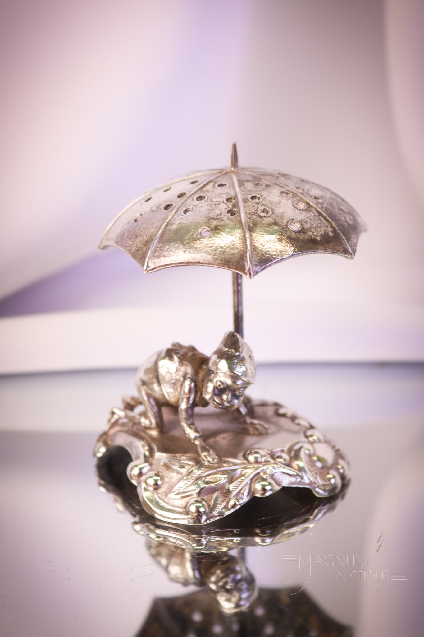 Pairpoint Victorian Silverplate Palmer Cox Brownie Figural Toothpick Holder: A whimsical little signed Pairpoint Victorian figural silverplate Palmer Cox Brownie with an umbrella toothpick holder. This little brownie is up to something! He's on his knees under the umbrella wit