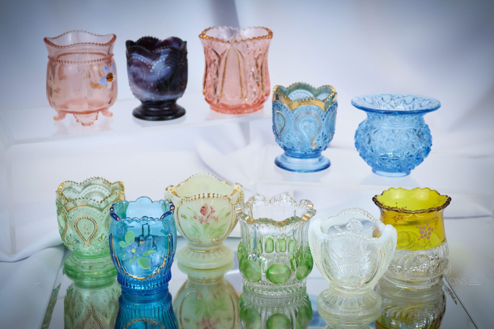 11 pc Lot EAPG Northwood & More Victorian Glass Toothpick Holders: Eleven desirable finds in Victorian glass toothpick holder. This lot includes two Wild Bouquet examples. Three Scroll with Acanthus pattern examples.Two Unusual pink examples and so much more. The lot