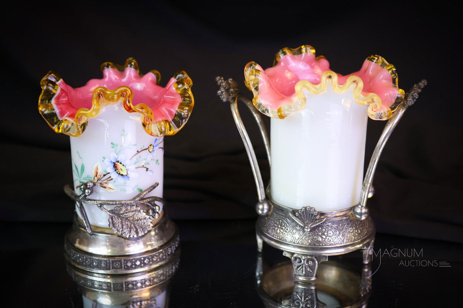 2 pc Lot Victorian Meriden Barbour Silverplate & Art Glass Toothpick Holders: Two selections that are sure to please. This lot offers to silverplate holders by Meriden and Barbour. Each has a peachblow ruffled toothpick in its grasp. One of the toothpicks is decorated. The tall