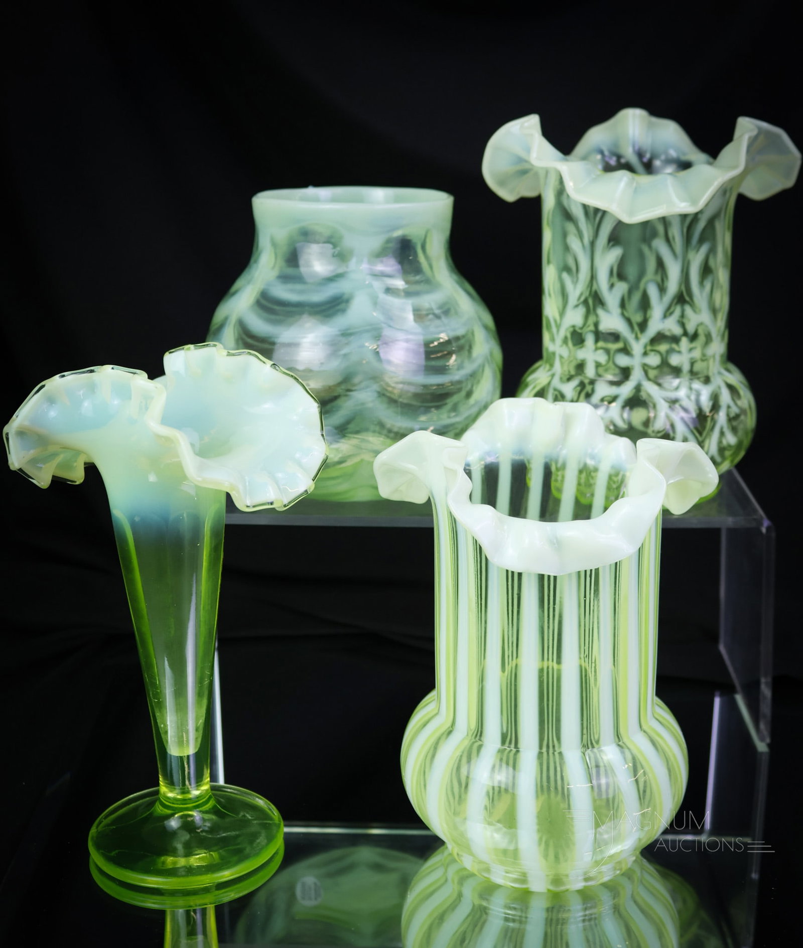 4 pc Lot Victorian Collectible Vaseline Uranium Pleasures in Glass: Four fun finds in Victorian Vaseline glass. Each piece is lovely in its own right. All of the items glow brilliantly under black light. The tallest of the offerings measures 7" tall and a girthy measu