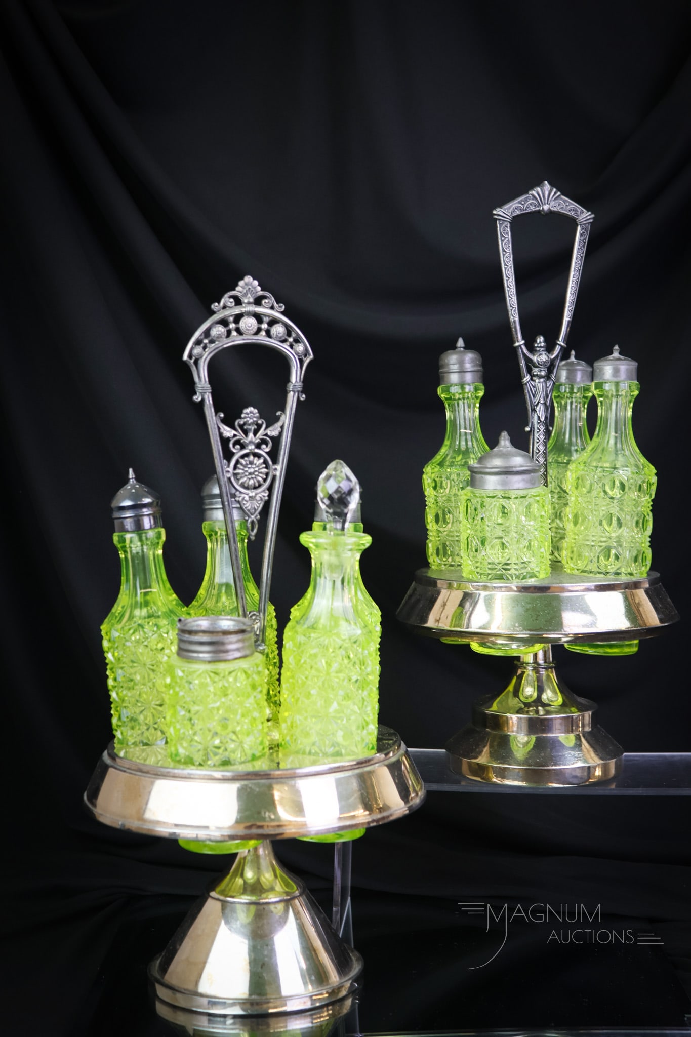 2 pc Lot Victorian Silverplate & Vaseline Uranium Glass Cruet Condiment Castor Sets: Two lovelies that are sure to please in Victorian silverplate and vaseline glass cruet condiment castors. One set is a five-bottle Daisy & Button set in an unmarked frame. The second is a four-bottle 