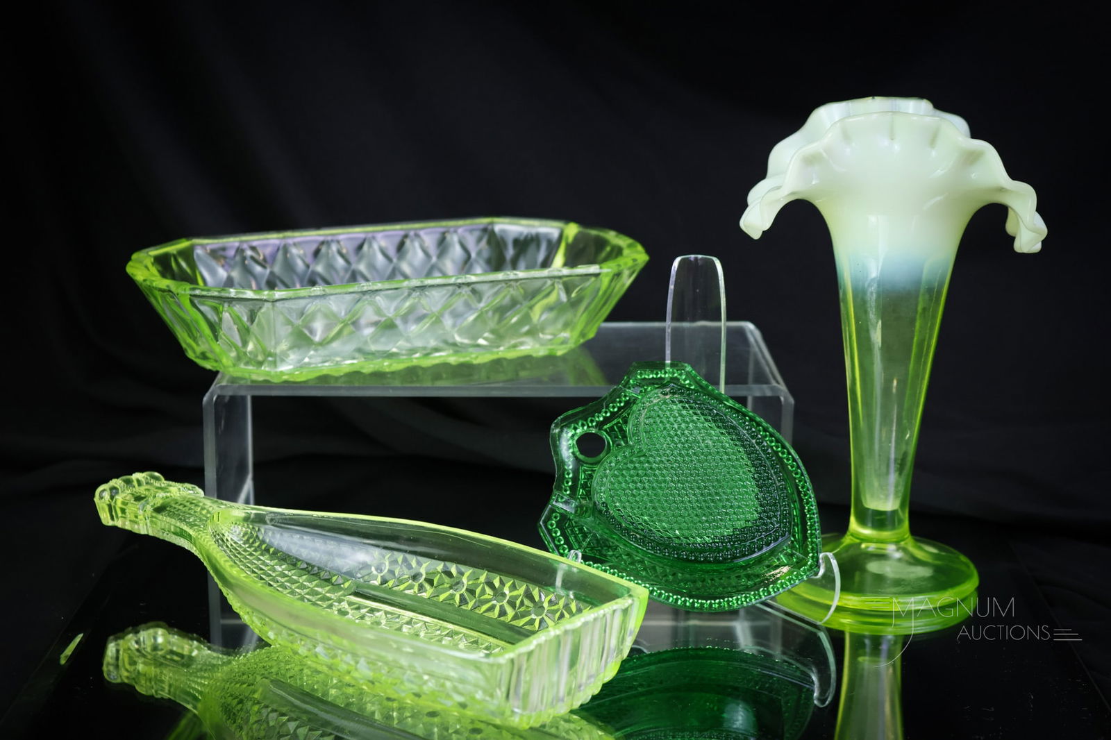 4 pc Lot Uranium Vaseline Opalescent Glass Sweet Nothings: Four sweet nothings in vaseline opalescent glass to whisper in your ear. This lot of glowing, gracious finds includes a bottle-shaped dish, a diamond quilt pickle dish, a heart match holder, and lastl