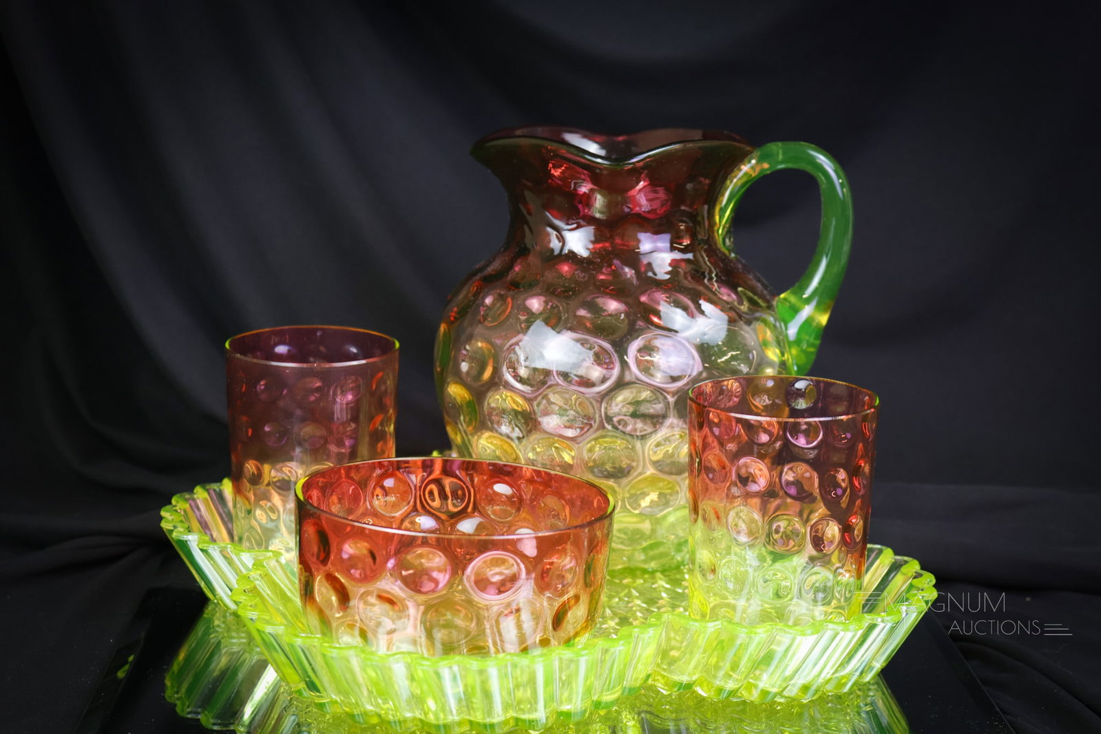 5 pc Lot Hobbs Vaseline Cranberry Uranium Glass Lemonade Set: You'll be the Uranie hostess with the mostess if you win this fine set of Hobbs glass. This lemonade set includes a uranium-rich tray in the Daisy and Button pattern, a pitcher, two tumblers, and a wa