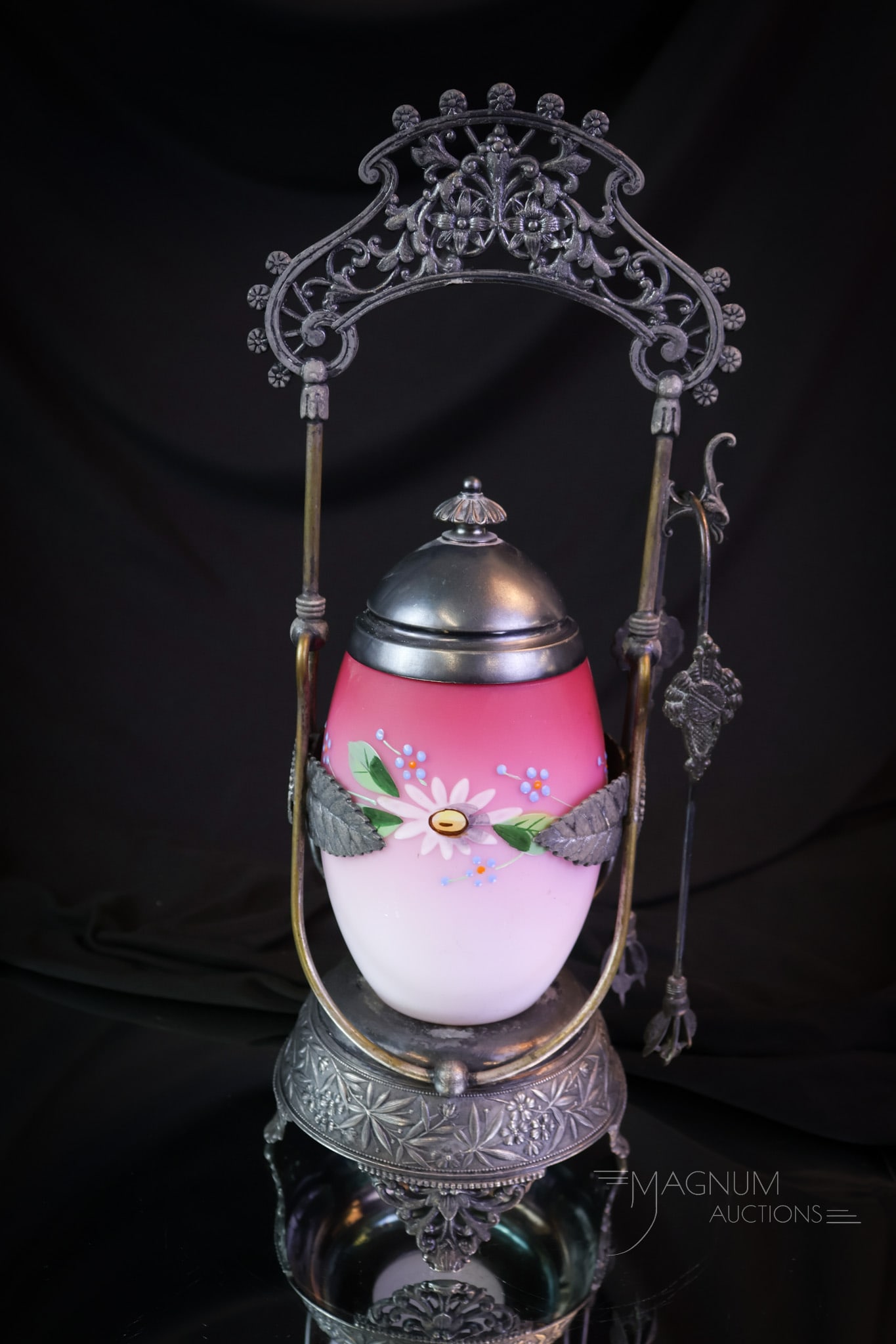 Meriden Silverplate Victorian Pink Enameled Glass Pickle Castor: Here's an ornate piece for your collection! This is a signed Meriden Victorian silverplate pickle castor. It is complete with a pink satin enameled glass egg-shaped insert. This wonderfully ornate cas