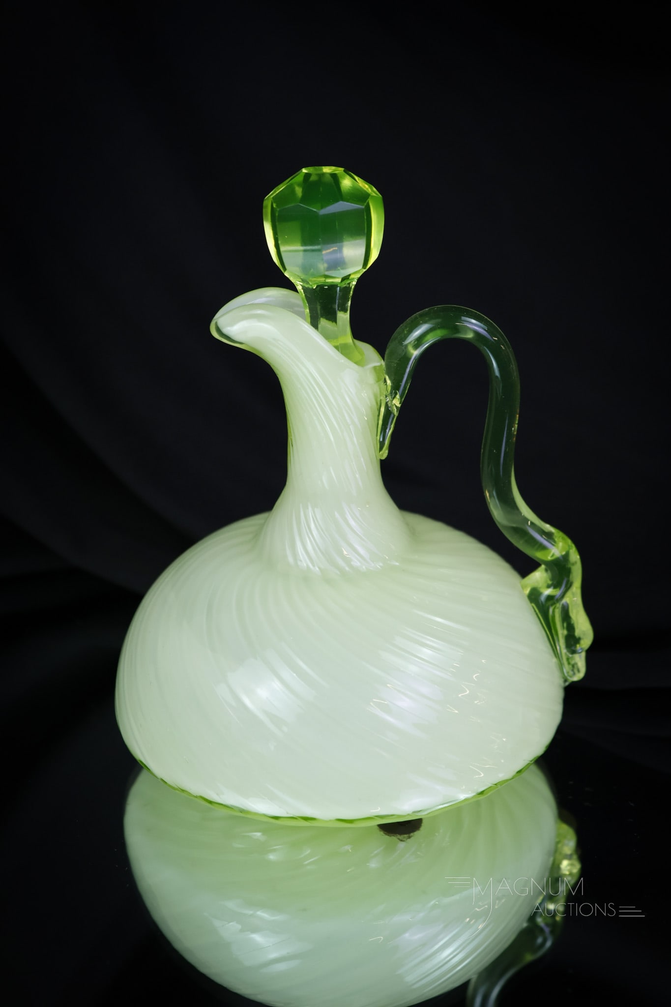 Hobbs Vaseline Uranium Glass Satina Swirl Victorian Glass Cruet: A stunning and rare find in Hobbs glass. This is a cruet in the Satina Swirl pattern. Also known as a Swansbill cruet because of the swan's head at the base of the applied handle. This super example i