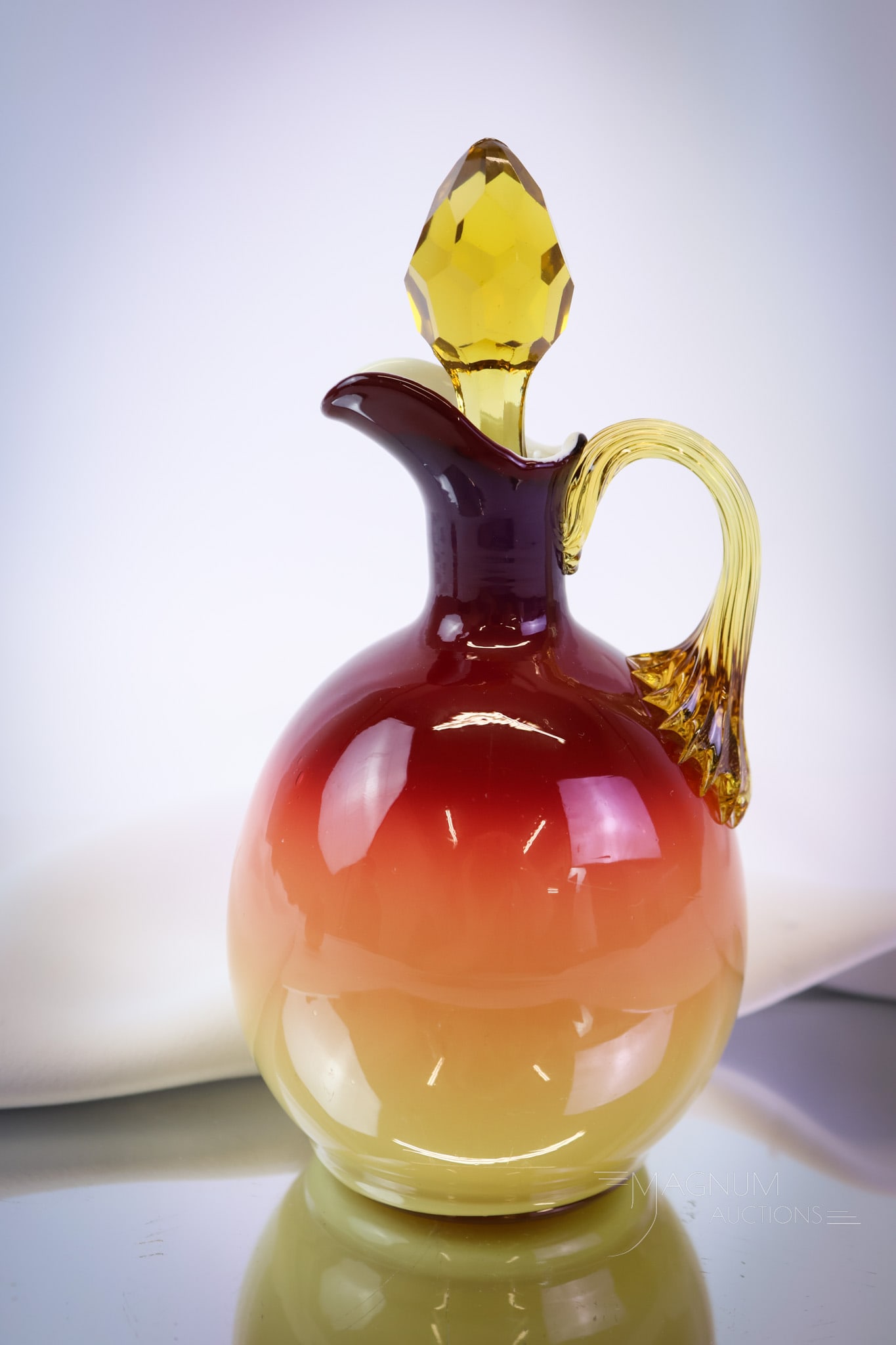 Hobbs Wheeling Peachblow Victorian Glass Cruet: A brilliant and richly colored find in Hobbs Victorfian glass. This cruet in an ovoid form is complete with the original stopper. The cruet measures 7" tall. As-made chipping is noted to the plunger e