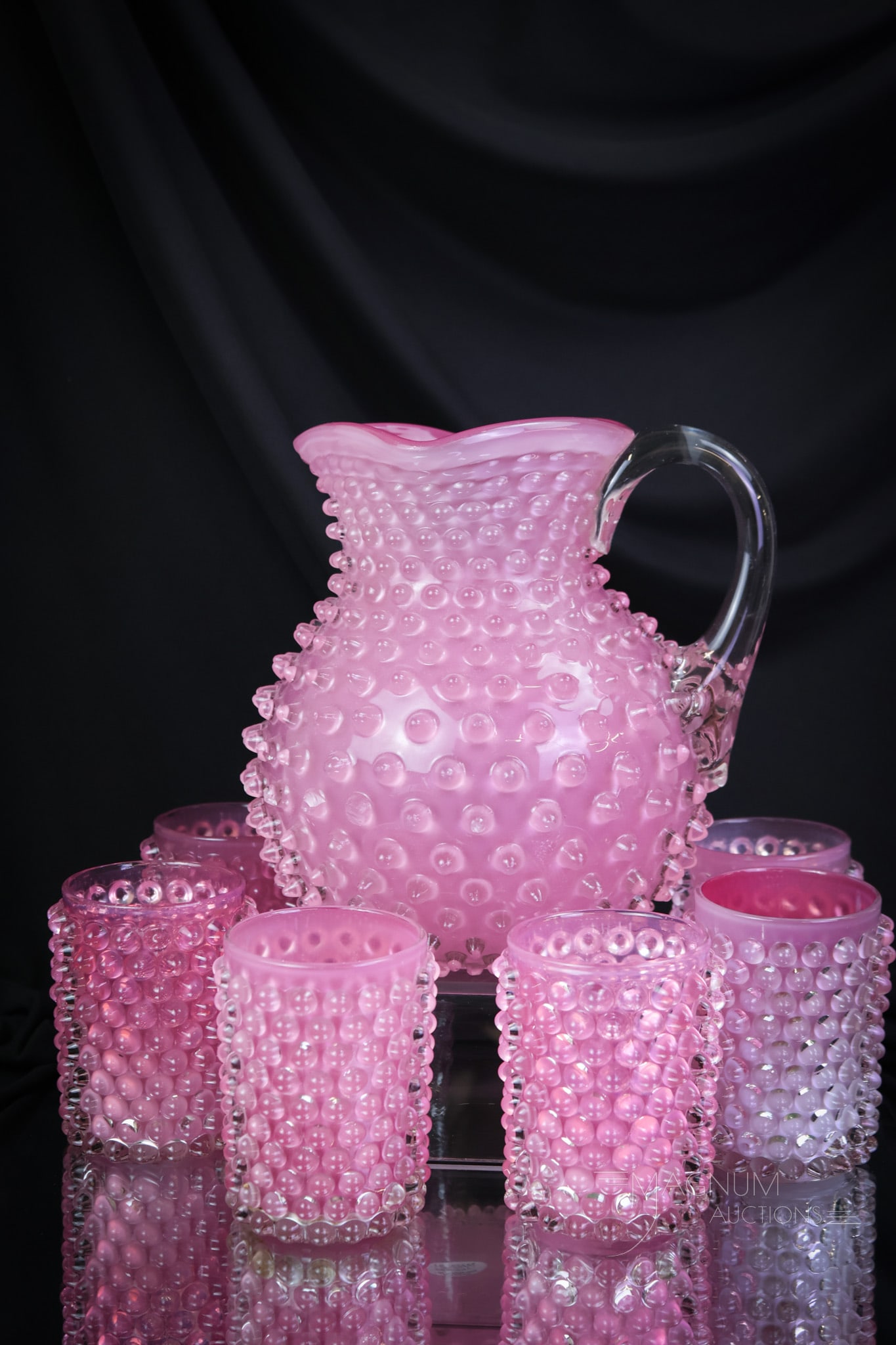 7 pc Hobbs Cased Glass Victorian Water Set: What a delight to find this Victorian Hobbs water set. This super mauve cased water set is made up of a pitcher and a full six tumblers. Each is as unique as the next. The coloring is delightful and v