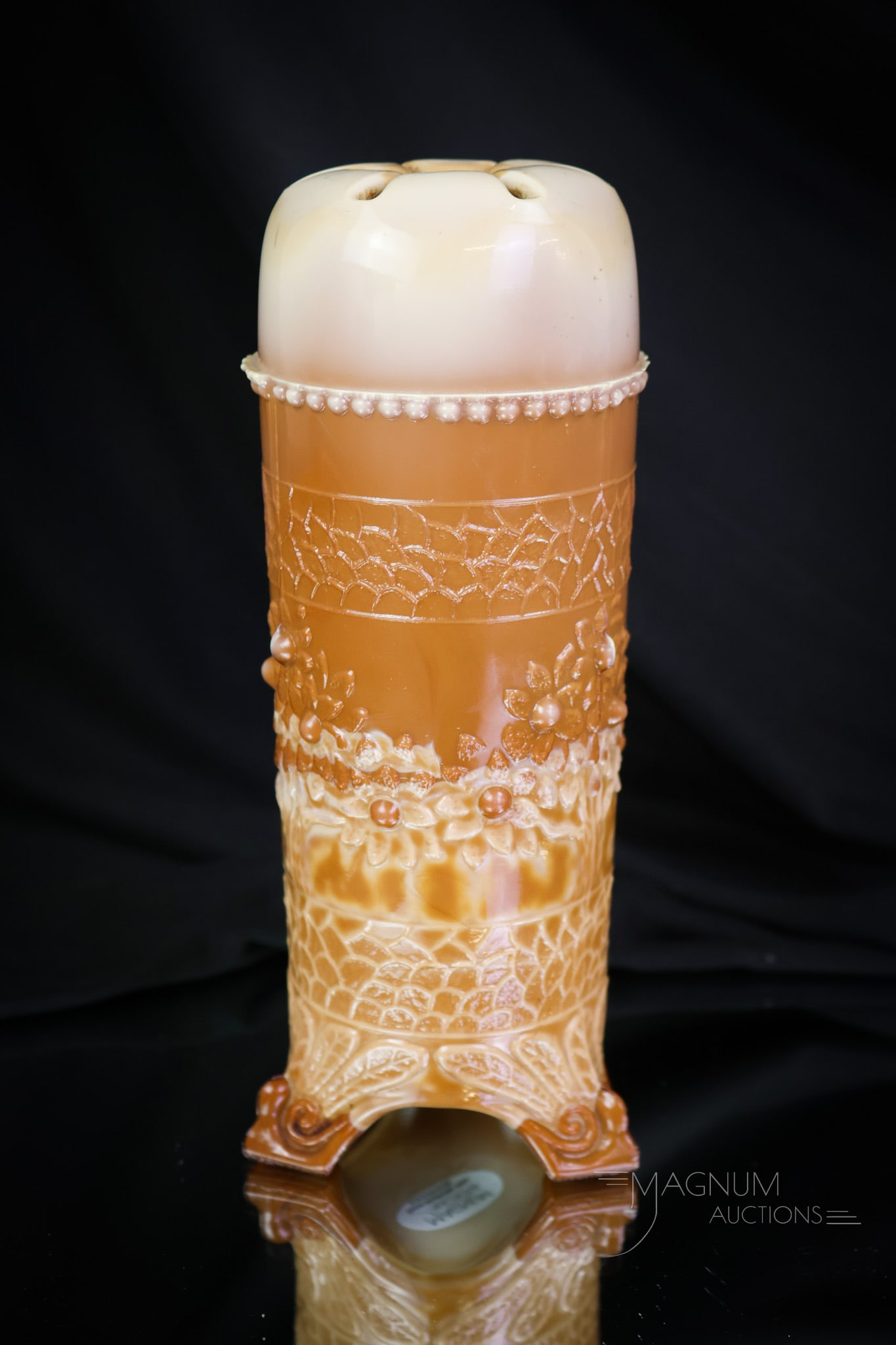 Fenton Chocolate Glass Orange Tree Hatpin Holder: A seldom-found piece of early Fenton glass. This is an Orange Tree pattern hatpin holder. A must-have collection piece! This super example measures 6 3/4" tall. Minor chiggers are noted on the feet, p