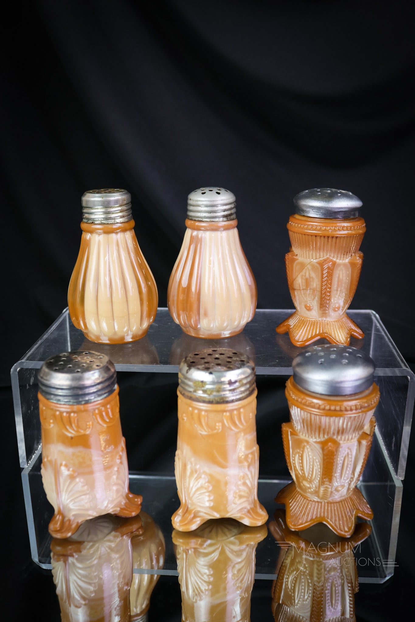 3 Pr Lot Victorian Greentown Chocolate Glass Salt Shakers: Here is a select offering of three pairs of Victorian Greentown glass shakers in chocolate glass. There's a pair of Cactus, leaf Bracket, and ribbed. One Leaf Bracket and one cactus have chips on the 