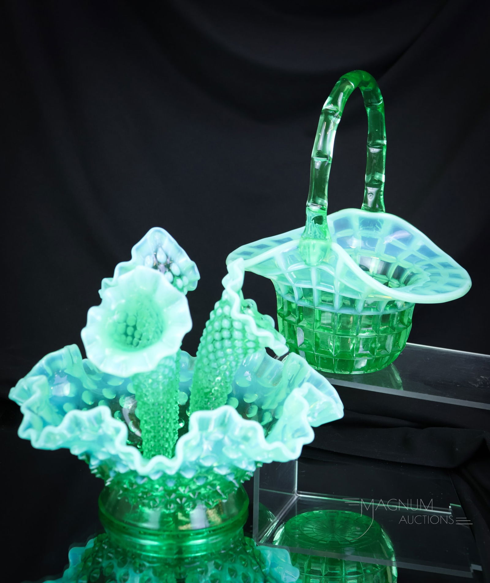 2 pc Lot Fenton Art Glass Emerald Uranium Green Glass Epergne & Basket: Two brilliant and glowing examples of Fenton art glass. This lot includes an apartment-sized epergne and a basket. The Uranies will love these as they light up under black light. Make way on the "glow