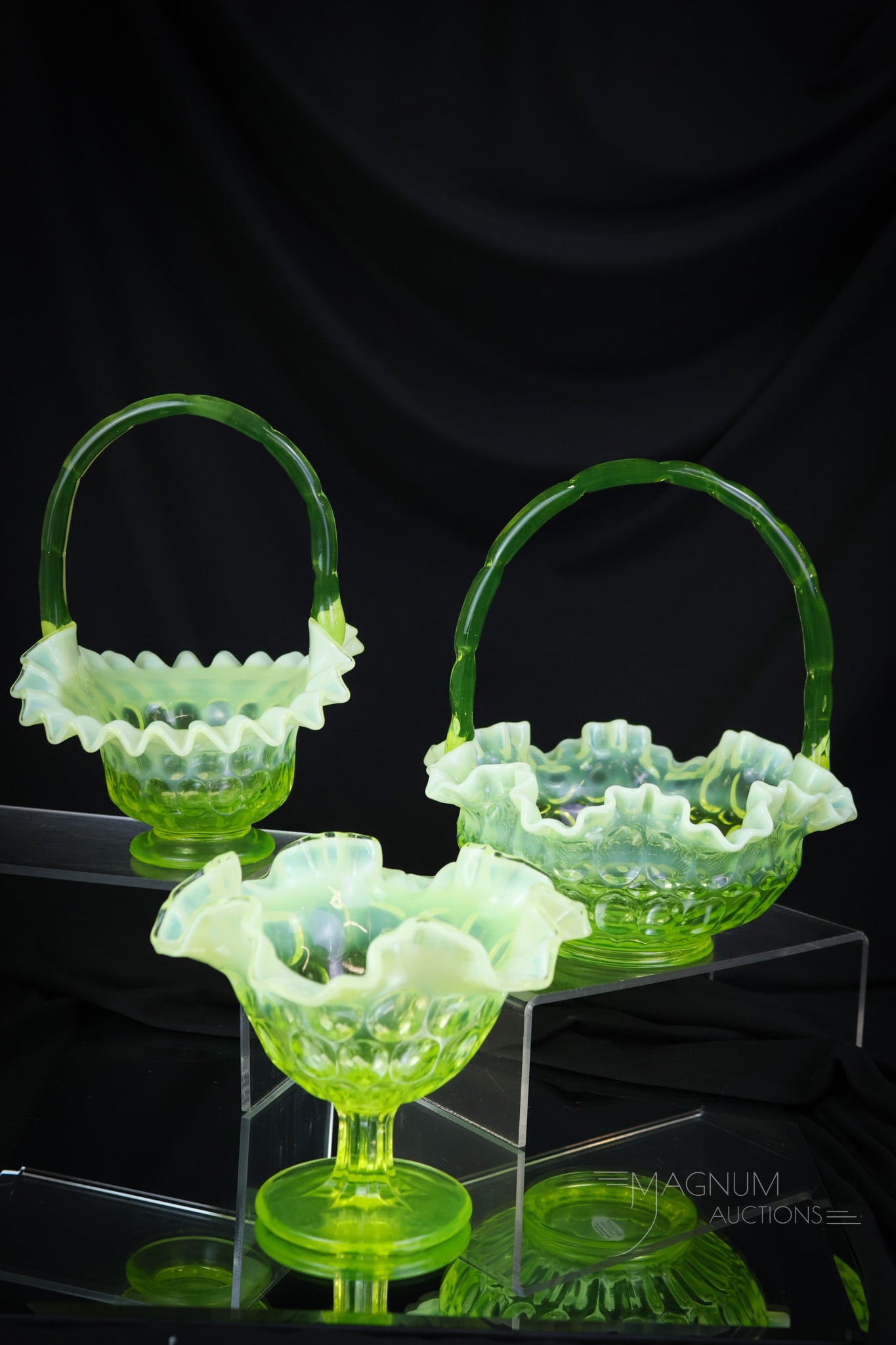 3 pc Lot Fenton Topaz Vaseline Uranium Glass: Three shiner examples of vaseline opalescent uranium-rich Fenton glass for your bidding pleasure. This trio includes two baskets and a compote. The tallest measures 9". SHIPPING NOTICE: If you choose