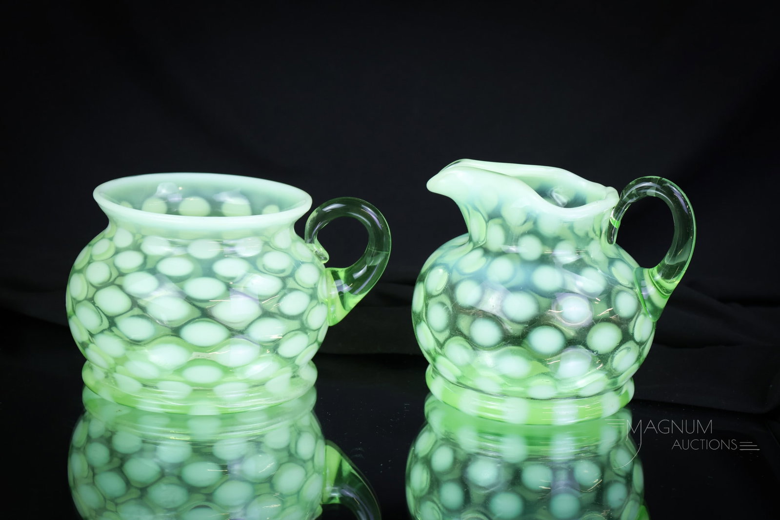 2 pc Lot 1930s Fenton Green Opalescent Uranium Glass: Two rare finds in uranium-rich Fenton glass from the 1930s. This lot features a coinspot creamer and single-handle sugar bowl in a rare form and green opalescent glass. The tallest of the set measures