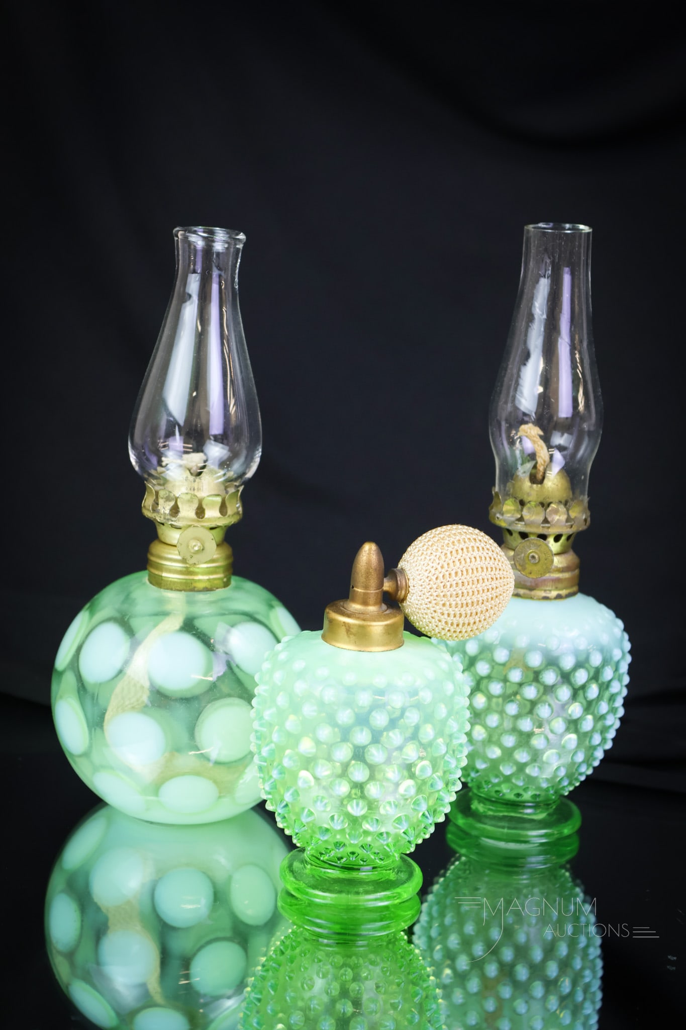 3 pc Lot Fenton Green Uranium Opalescent Glass Mini Lamps & More: Three glowing pieces of uranium-rich green opalescent Fenton glass comprise this generous offering. There are a Hobnail pattern and Coinspot pattern miniature oil lamps. These, along with a perfum ato