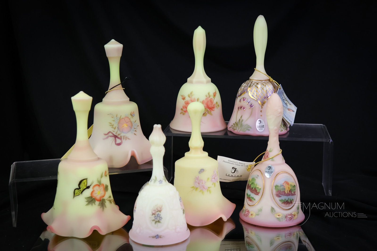 7 pc Lot Fenton Burmese Uranium Glass Decorated Bells: One for each day of the Vasie week. Each of these beautiful examples is hand-painted and a desirable find for your collection. The tallest of the lot measures 7". SHIPPING NOTICE: If you choose not to