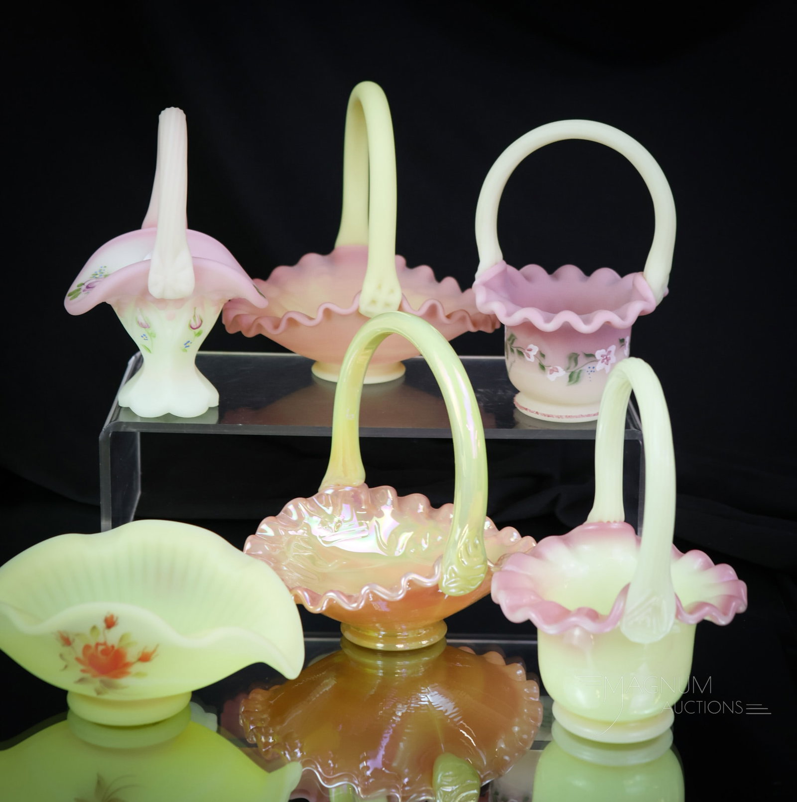 6 pc Lot Fenton Burmese Uranium Art Glass Miniature Baskets: Three are decorated. Three are not. Each basket is made in uranium-rich burmese glass. The tallest measures 5". SHIPPING NOTICE: If you choose not to utilize the LiveAuctioneers LiveShip program, MAGN