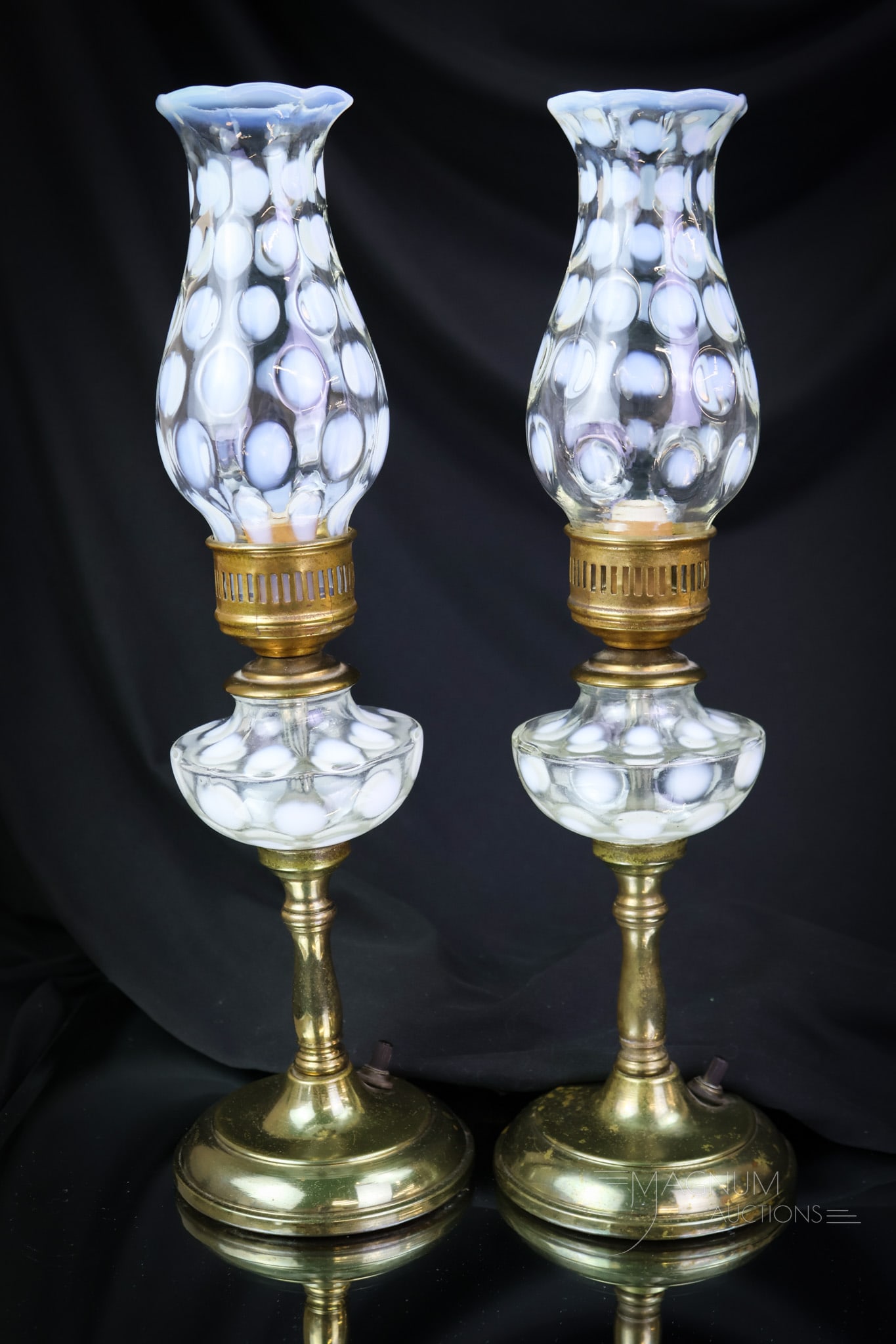 Pair Fenton Opalescent Boudoir Lamps: Select find in this pair of Fenton opalescent boudoir lamps in French opal. Each lamp measures 14" tall. SHIPPING NOTICE: If you choose not to utilize the LiveAuctioneers LiveShip program, MAGNUM AUCT