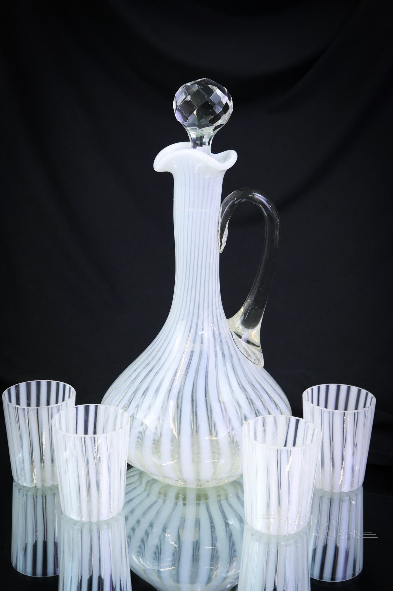 5 pc Victorian Northwood Opalescent Stripe Decanter Set: A seldom found attributed to Northwood opalescent Stripe pattern Victorian glass decanter set. This set is complete with decanter and four matching cordials. The tallest measures 12". SHIPPING NOTICE: