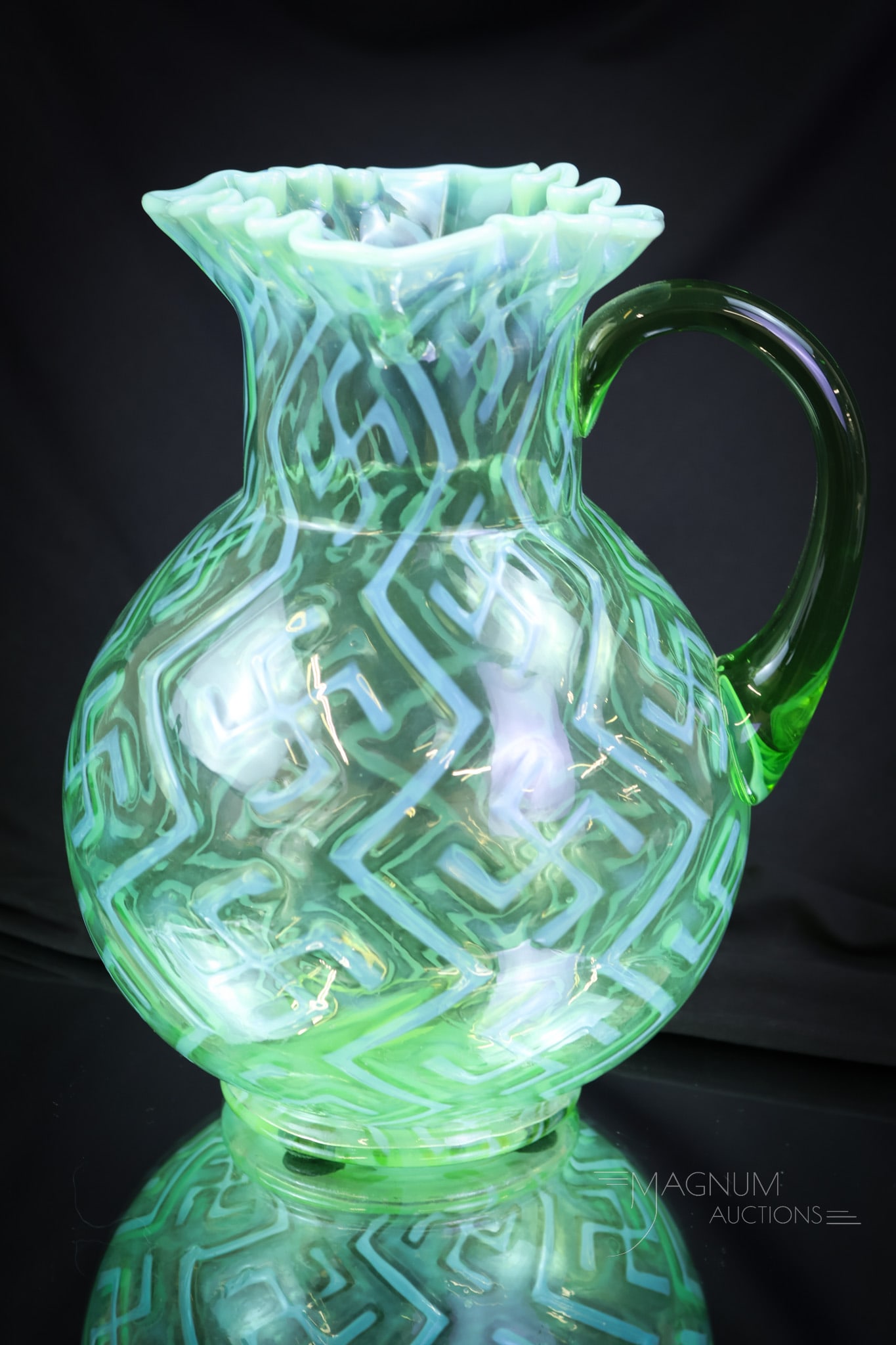 Very Rare Northwood Green Opalescent Swastika Victorian Glass Water Pitcher: A very rare find in Victorian opalescent glass. This is Northwood's Swastika pattern pitcher in green opalescent. This ball-shaped pitcher is a perfect example. Are you going to be lucky enough to own