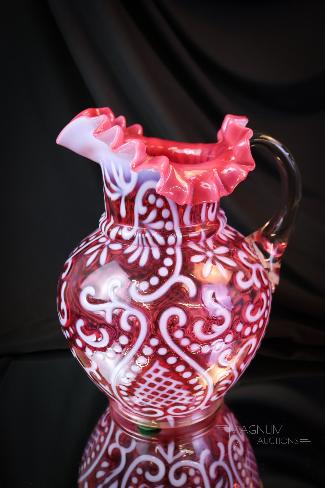 Northwood Cranberry Opalescent Arabian Nights Water Pitcher: A beautiful cranberry opalescent Victorian Northwood water pitcher in the Arabian Nights pattern. This excellent example is a must-have piece for any opalescent collection. The pitcher measures 9" tal