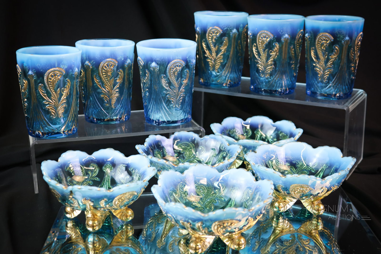 11 pc Lot Northwood Blue Opalescent Victorian Inverted Fan & Feather Glass: A fine offering of eleven pieces of Northwood Blue Opalescent gilt decorated glass. This lot offers a set of six tumblers and five individual berry bowls. The tallest measures 4". SHIPPING NOTICE: If 