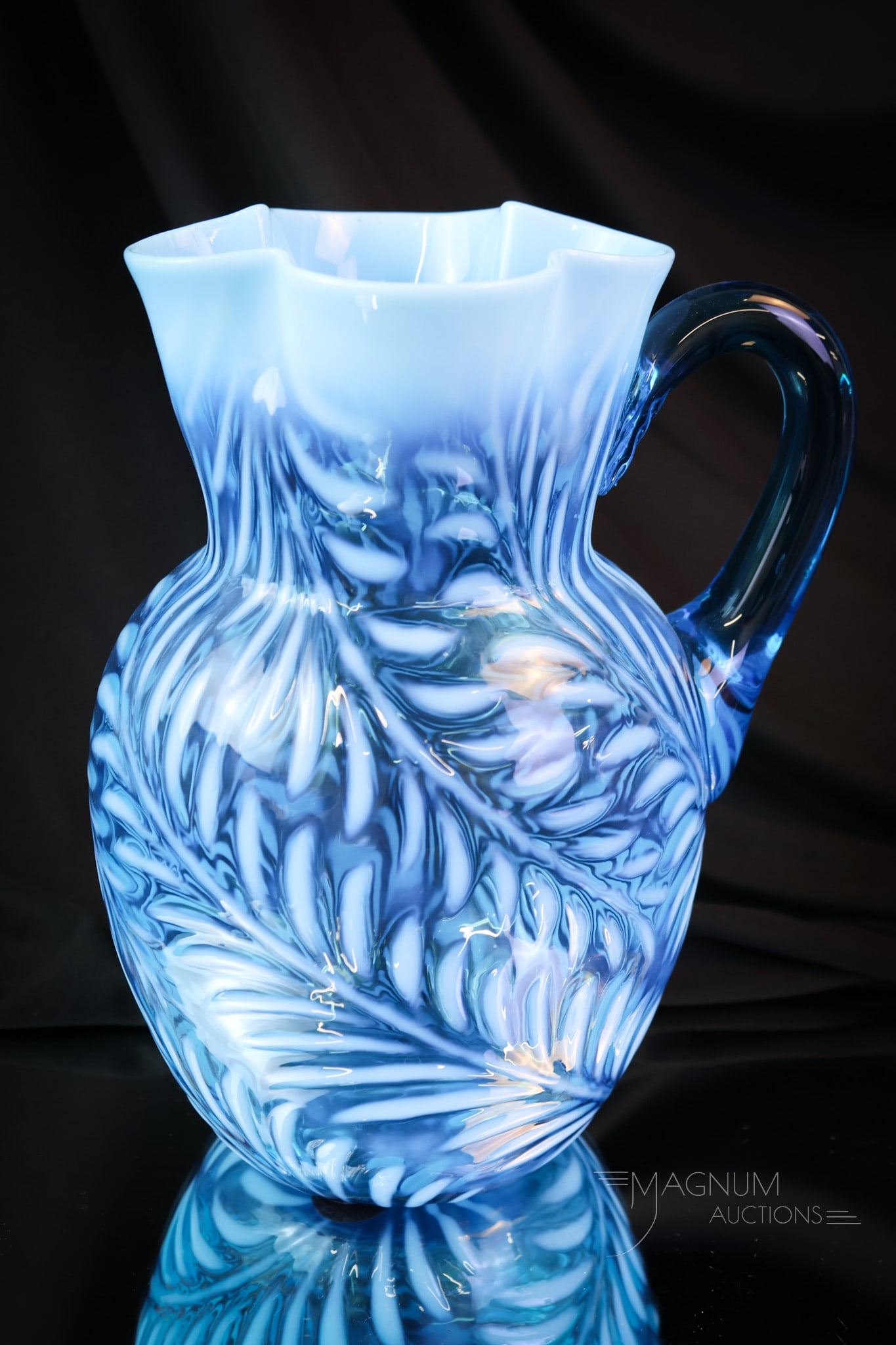 Blue Opalescent Fern Victorian Glass Water Pitcher: If you buy the cranberry, you'll have to buy this blue one. This pitcher has a gorgeous, pleasing form and excellent coloring. The pitcher stands 9 1/2" tall. SHIPPING NOTICE: If you choose not to uti