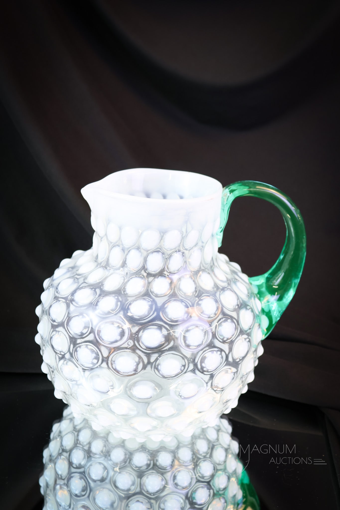 Rare Opalescent Hobnail Victorian Glass Water Pitcher: Another rare find in a Victorian Hobnail pattern water pitcher. This one is crisp white opal on crystal. This super piece has an added benefit of an aqua applied handle. How unique! The pitcher measur