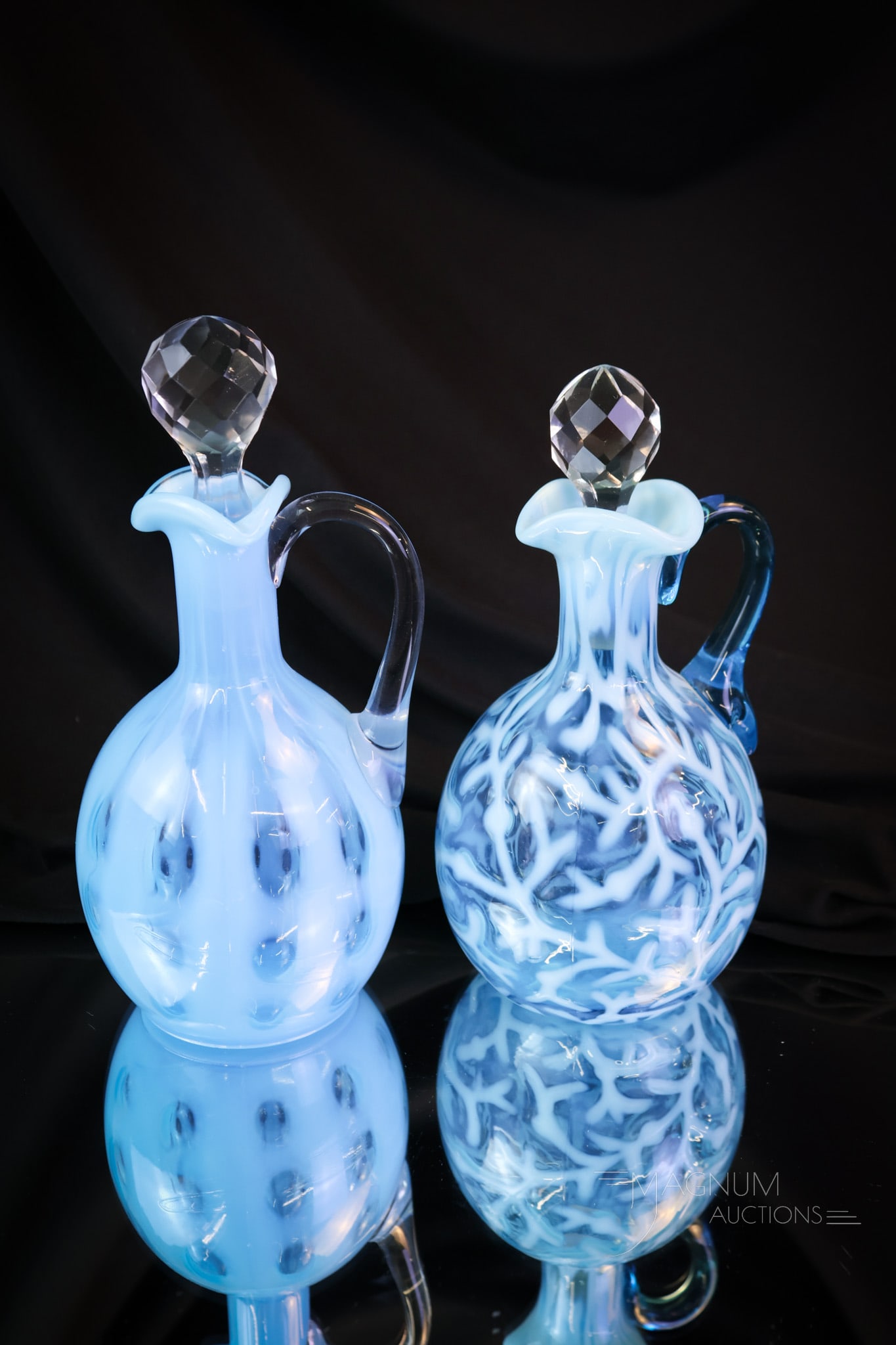 2 pc Lot Blue Opalescent Victorian Glass Cruets Polka Dot & Seaweed: A select offering of two collectible Victorian glass cruets in blue opalescent. One in the Seaweed pattern and one in the Polka Dot pattern. Both are scrumptious examples. The tallest measures 8". SHI
