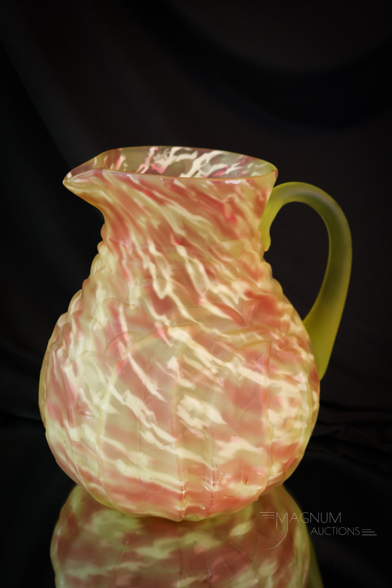 Northwood Vaseline Cranberry Uranium Spatter Victorian Satin Glass Pitcher: You'll need this fine pitcher if won the two tumblers in the previous lot. This pitcher is a fan favorite by Northwood. It’s the Leaf Mold pattern in uranium-rich vaseline cranberry satin spatter gl