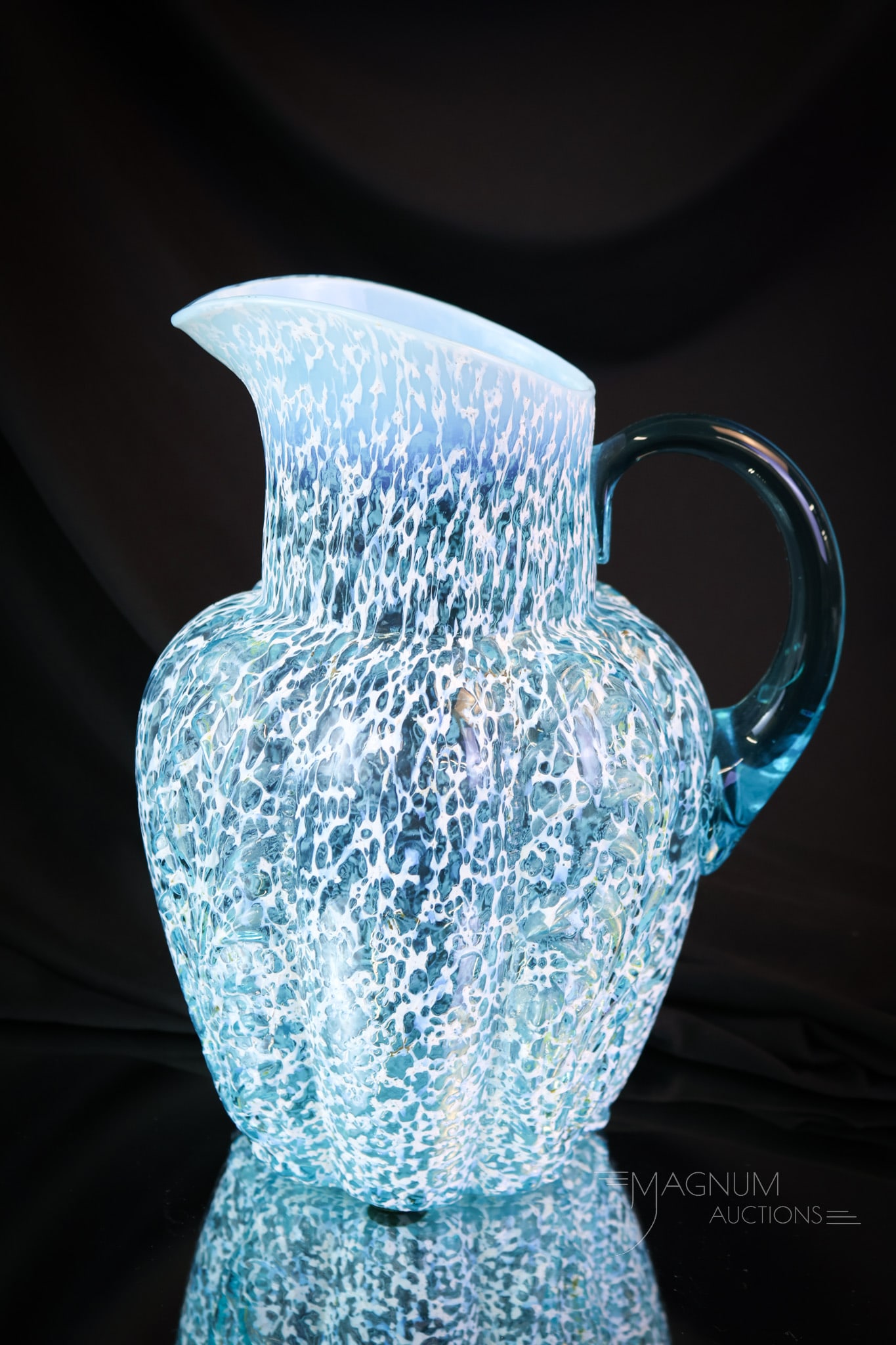 Rare Northwood Frit Victorian Glass Water Pitcher: A rare find in the Panelled Sprig pattern by Northwood. This pitcher measures a full 9 1/2" tall. It is in beautiful blue with white frit finish. SHIPPING NOTICE: If you choose not to utilize the Live