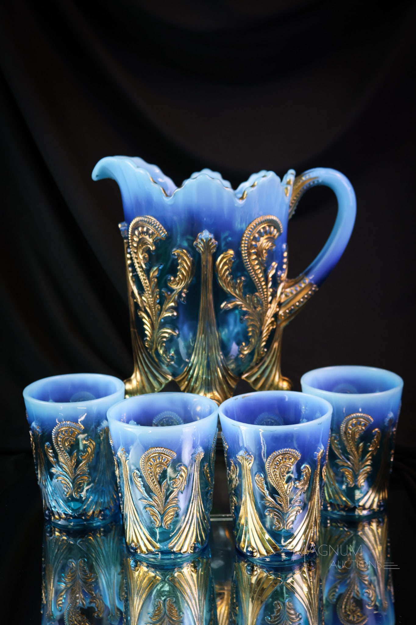 5 pc Northwood Blue Opalescent Glass Inverted Fan & Feather Victorian Water Set: Always a striking find in blue opalescent glass. This is a five-piece water set in the Northwood Inverted Fan & Feather pattern. Brilliant gold is a highlight of this offering. The tallest of the set 