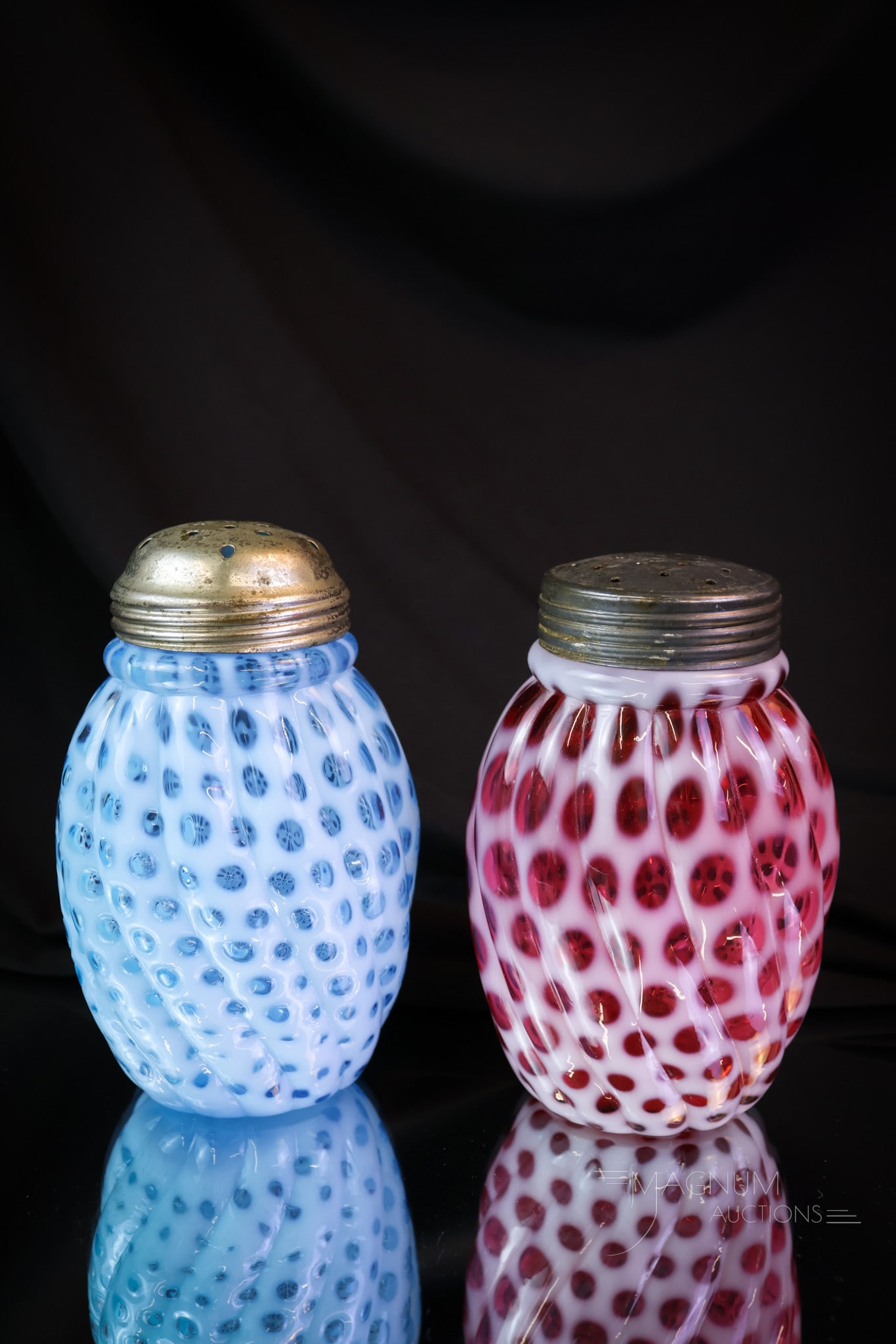 2 pc Lot Hobbs Cranberry & Blue Opalescent Victorian Glass Sugar Shakers: A wonderful pairing of two Victorian glass suga shakers made by Hobbs in different colors. One is rich cranberry and the other a beautiful blue. Both in the opalescent Windows pattern. Each measures 5