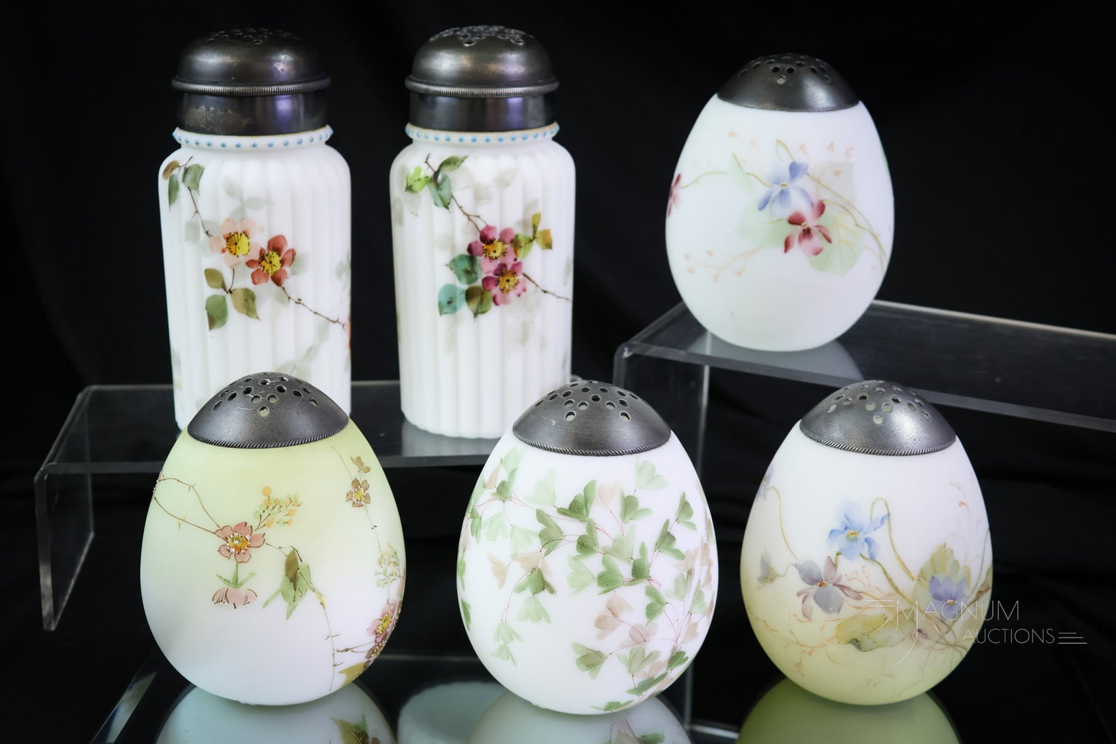 6 pc Lot Mt. Washington & More Glass Victorian Sugar Shakers: Six amazing and collection enhancing finds to dazzle you. This lot includes four Mt. Washington egg shakers and two Smith Bros. Ribbed Pillar Mold. Each shaker is delicately decorated with florals. Th