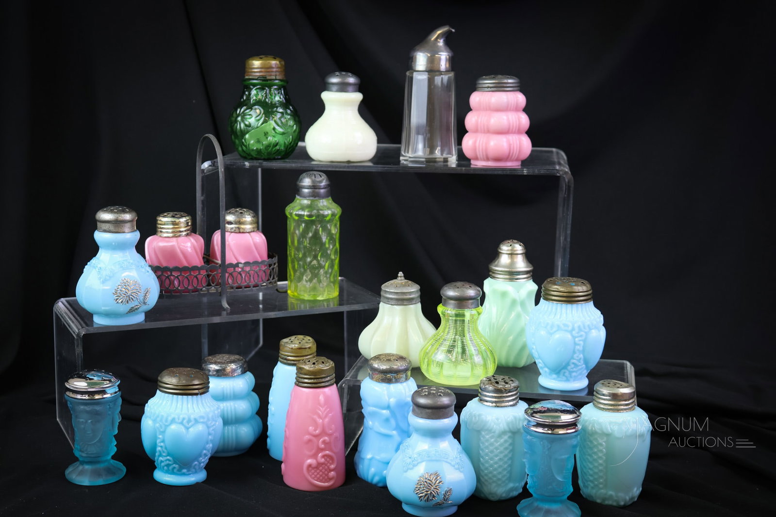 22 pc Lot Assorted Victorian Glass Salt Shakers: Twenty two unique shakers are found in this wonderful offering of colorful shakers. There's vaseline, pink, blue, and more. Makers such as Northwood, Dithridge, and more are represented. The tallest m