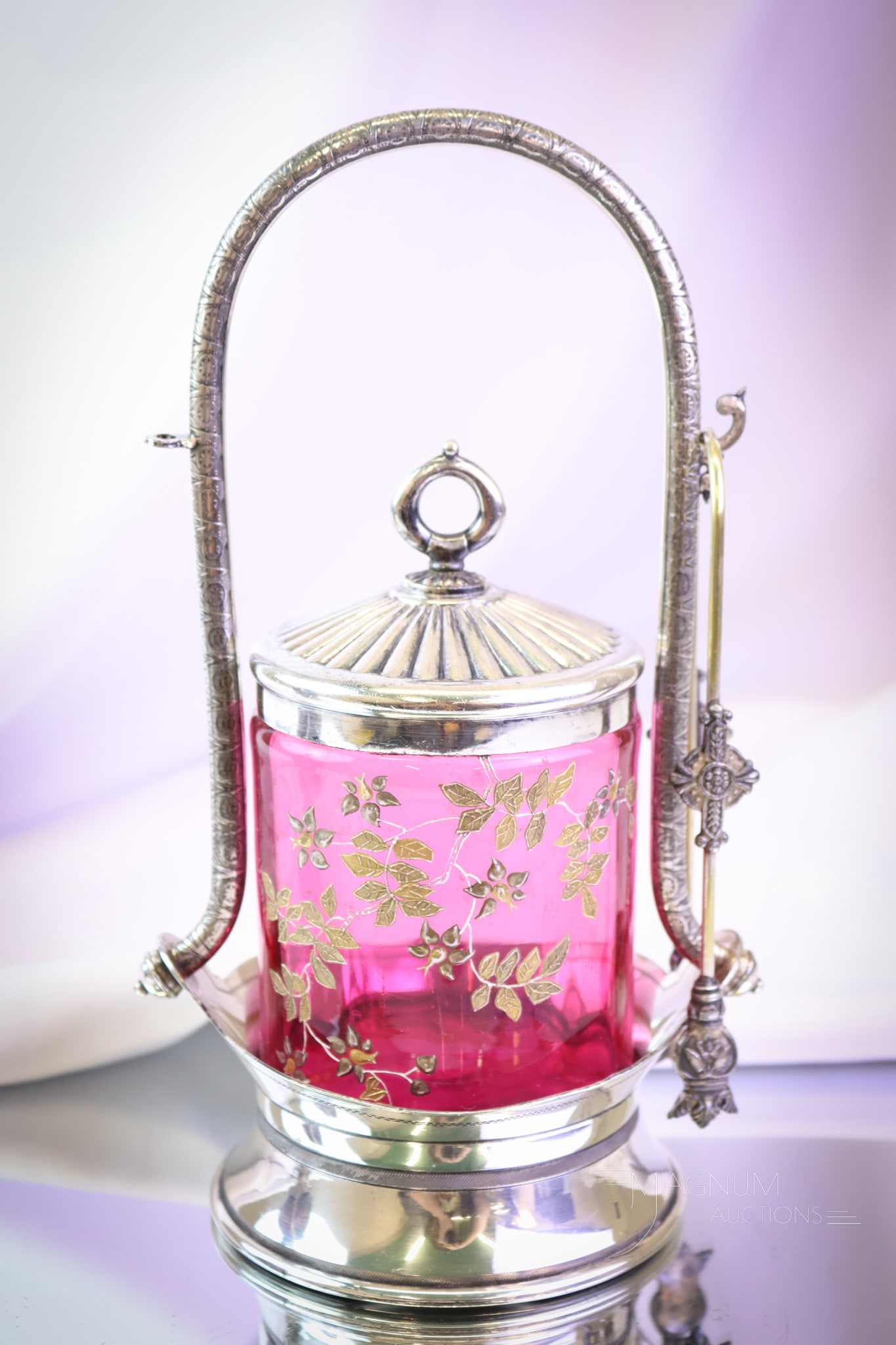 Victorian Wilcox Silverplate Cranberry Gilt Enameled Glass Pickle Castor: A simple yet elegant Victorian cranberry gilt and enameled glass and silverplate pickle castor. This one is signed Wilcox. The cranberry jar has gorgeous coloring. The castor measures 10" tall. SHIPPI