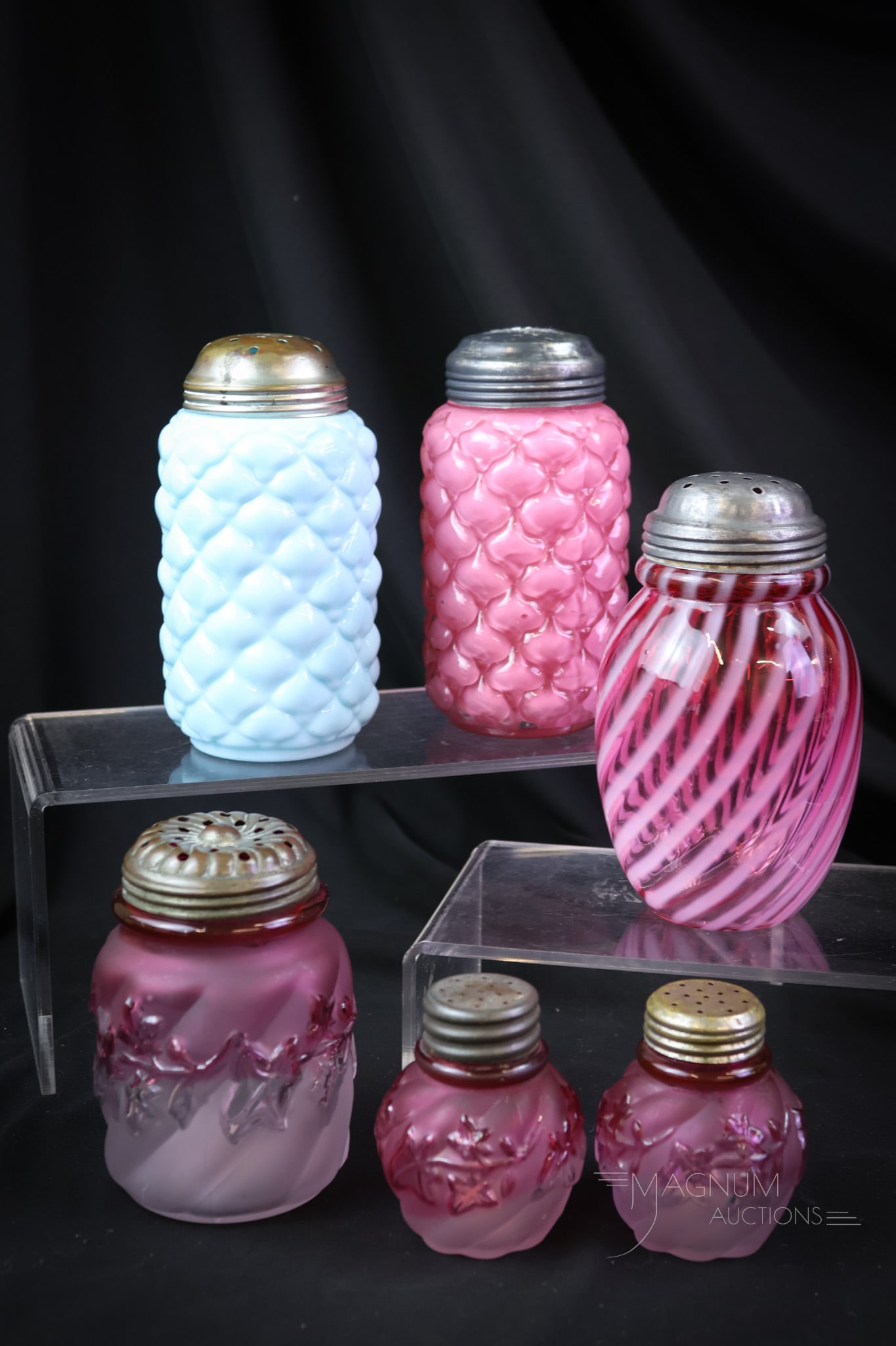 6 pc Lot Victorian Glass Salt & Sugar Shakers: A wonderful assortment of Victorian glass salt and sugar shakers to add to your collection. This lot includes two Consolidated Cone pattern suga shakers, a Hobbs Cranberry opalescent Swirl. A Northwoo