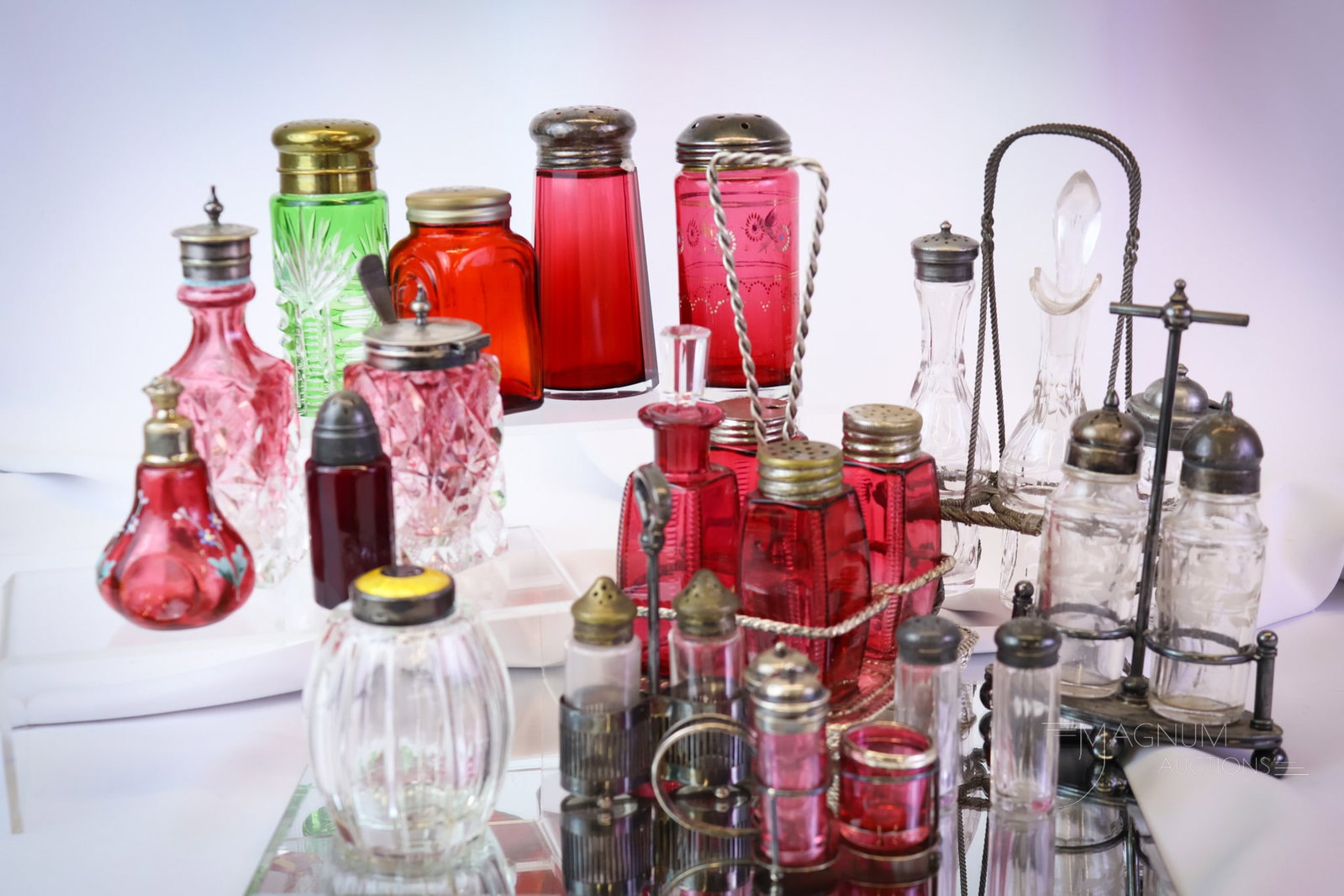 15 pc Lot Extravaganza Victorian Cranberry & More Salt Shakers: An assortment of various Victorian and more salt shakers for your bidding pleasure. Some are in frames Some are not. Some are enamel decorated. Some are cranberry cut to clear. The tallest measures 9"