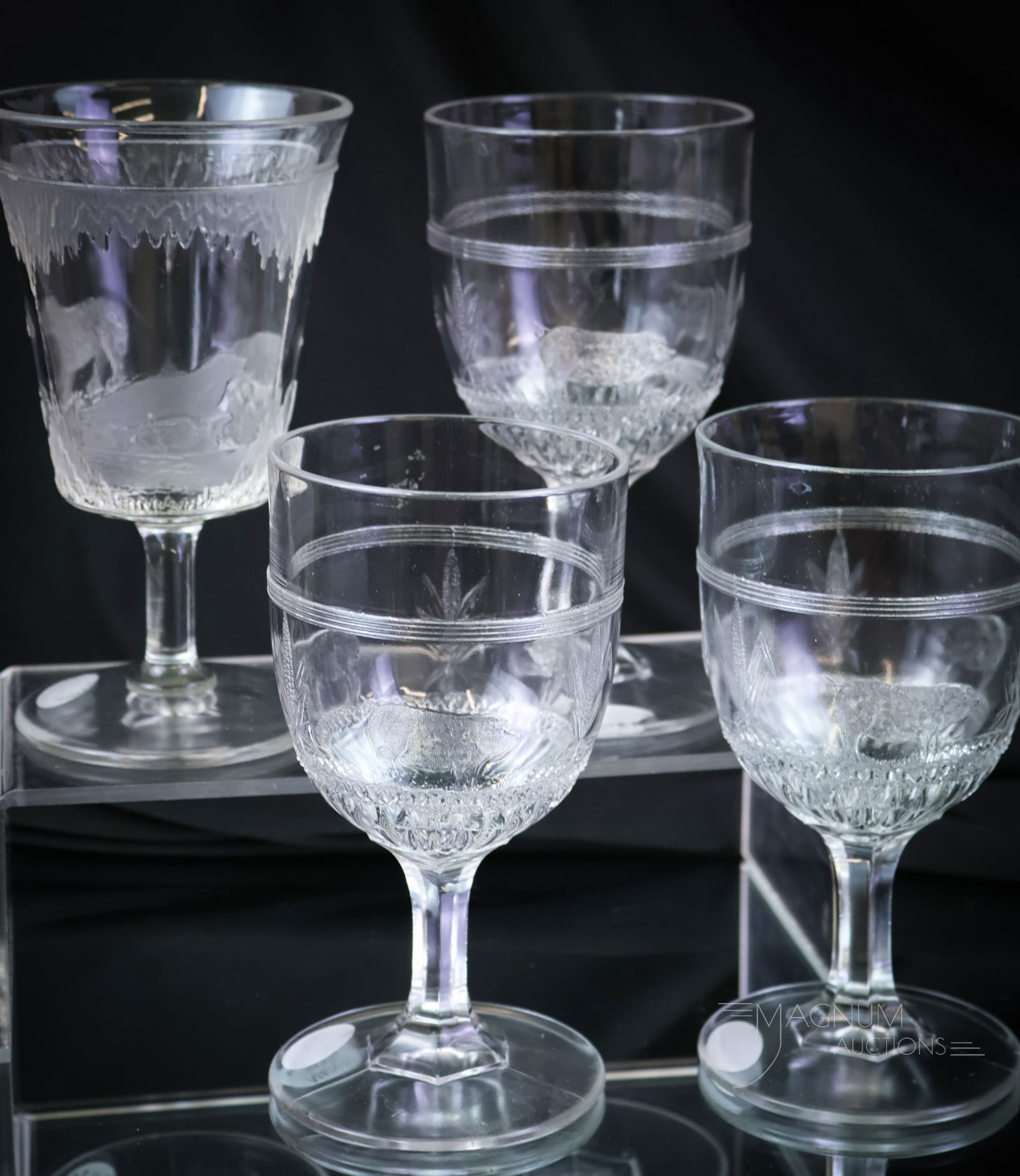 4 pc Lot EAPG Victorian Glass Goblets Pigs & Corn & Polar bear: Some very fine EAPG Victorian glass goblets. There are three examples of the Pigs & Corn pattern and one example of the Polar Bear pattern. The tallest measures 6 1/4". SHIPPING NOTICE: If you choose