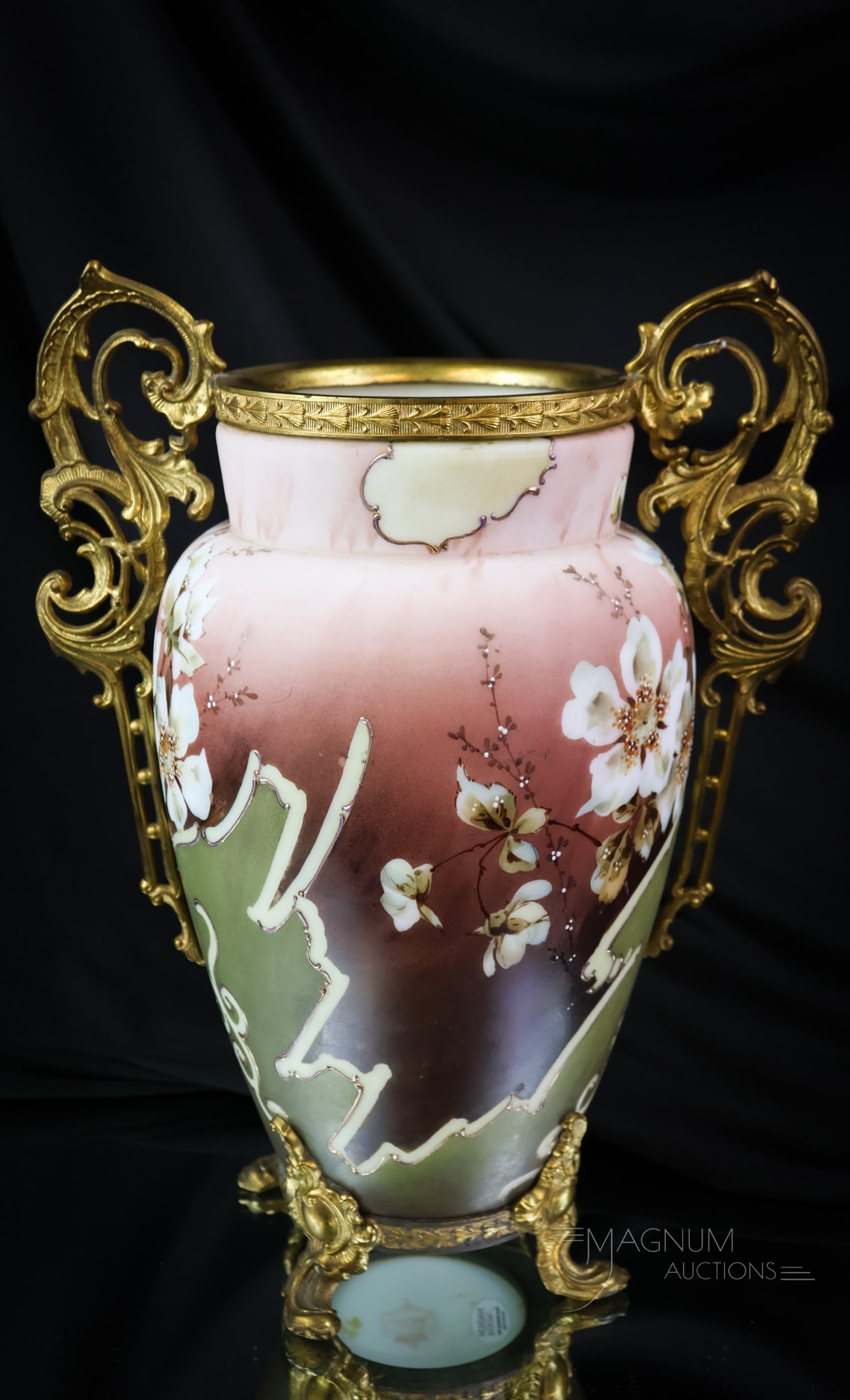Signed 12" Wavecrest Victorian Glass Ormulu Mantle Vase: A big and beautiful signed Wavecrest Victorian glass mantle vase. This wonderful find is complete with ormulu handles and feet. Is is decorated with stylized flowers on a maroon ground. The vase measu